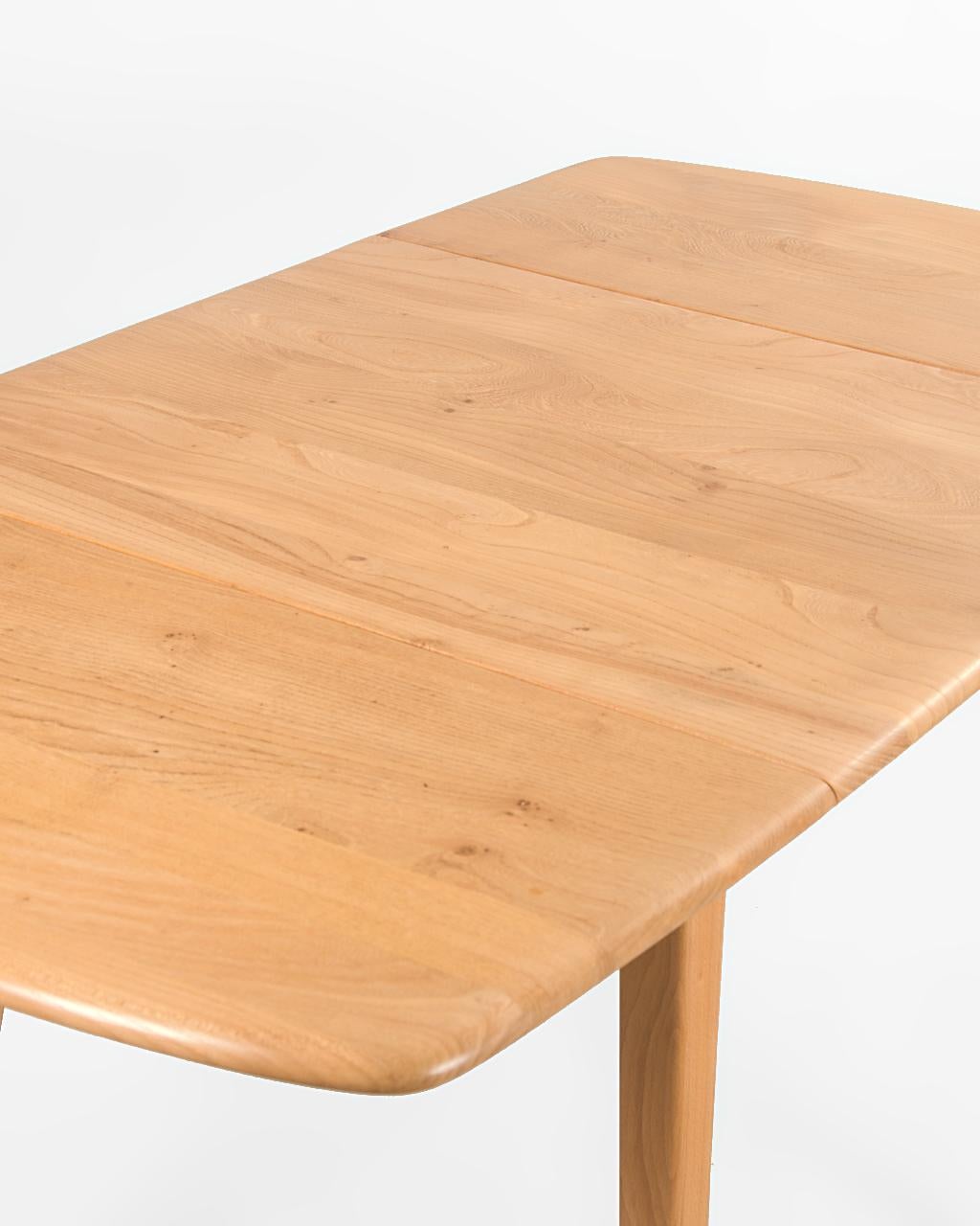 Beech and Elm Foldable Dining Table by L. Ercolani for Ercol, circa 1960 In Excellent Condition For Sale In CANGAS, ES