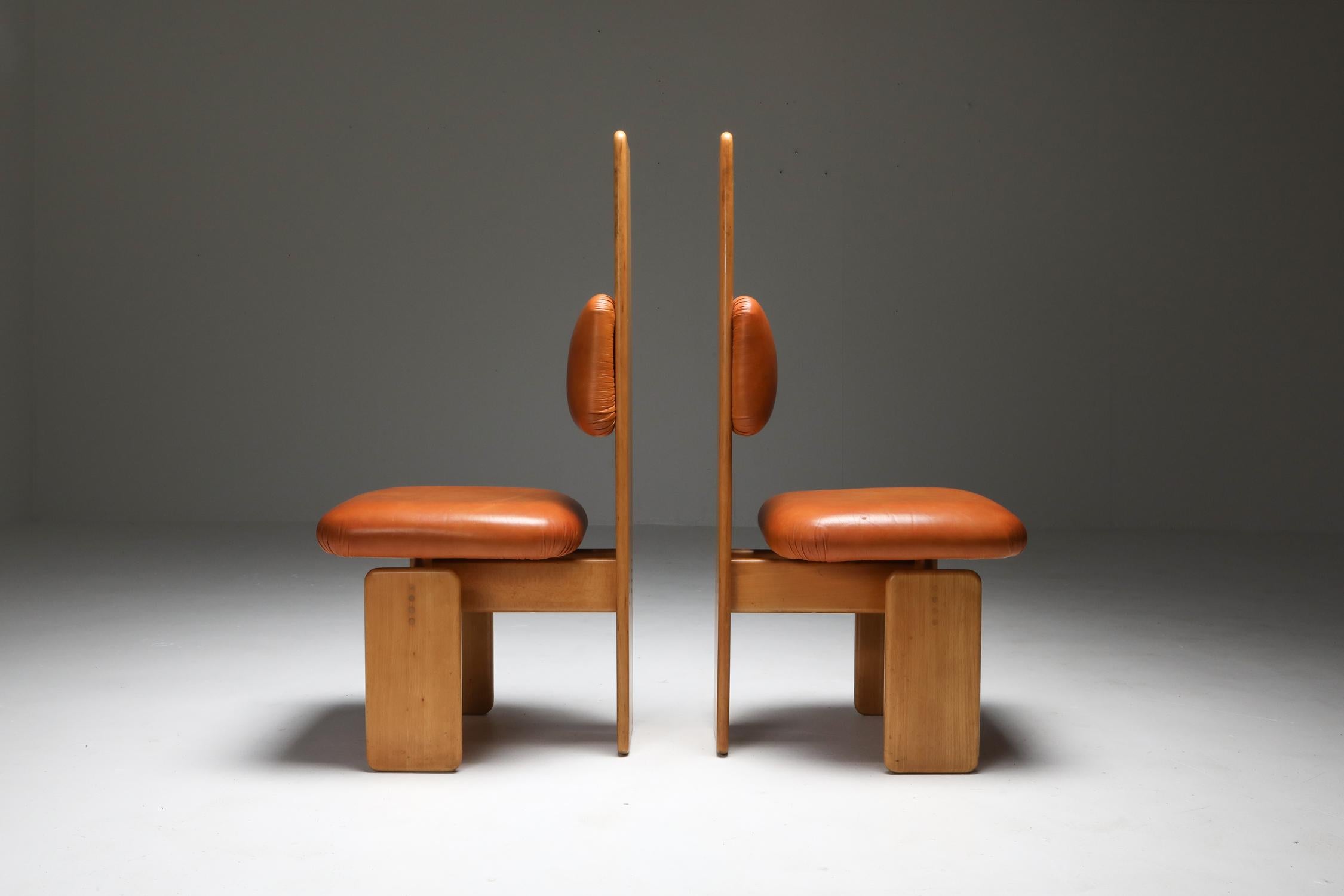 Mario Marenco dining chairs, set of six, Postmodern, beech, tan leather, Italy 1970s

Impressive and tall chairs made in solid beech.
The seating has a tan / cognac leather upholstery.
Very sculptural and well designed set in the style of Afra &