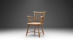 Armlehnstuhl aus Buche und Schilfrohr von Arno Lambrecht für WK Möbel, Deutschland 1950er Jahre