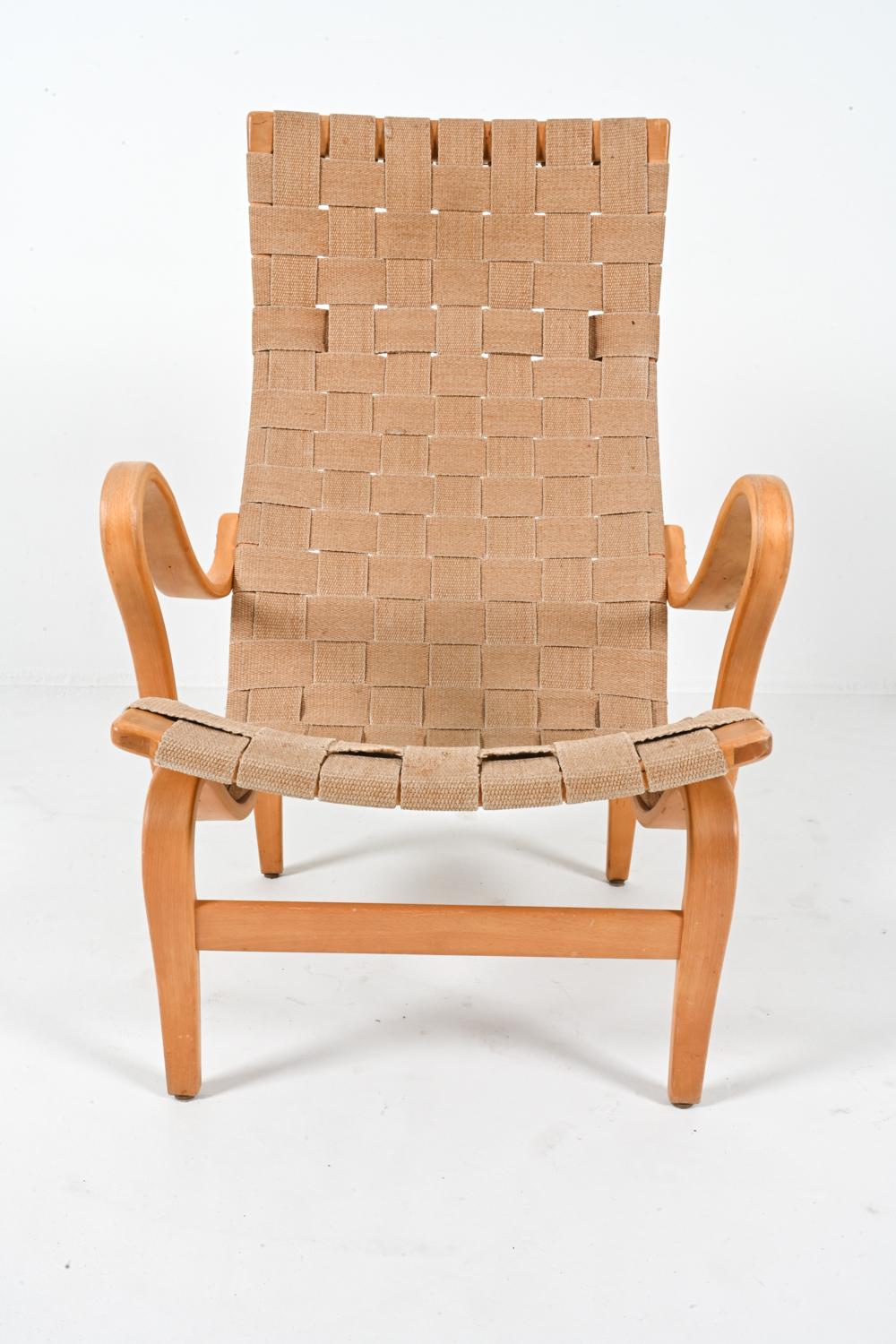 Swedish Beech 'Eva' Chair and Footstool by Bruno Mathsson, 1970's For Sale