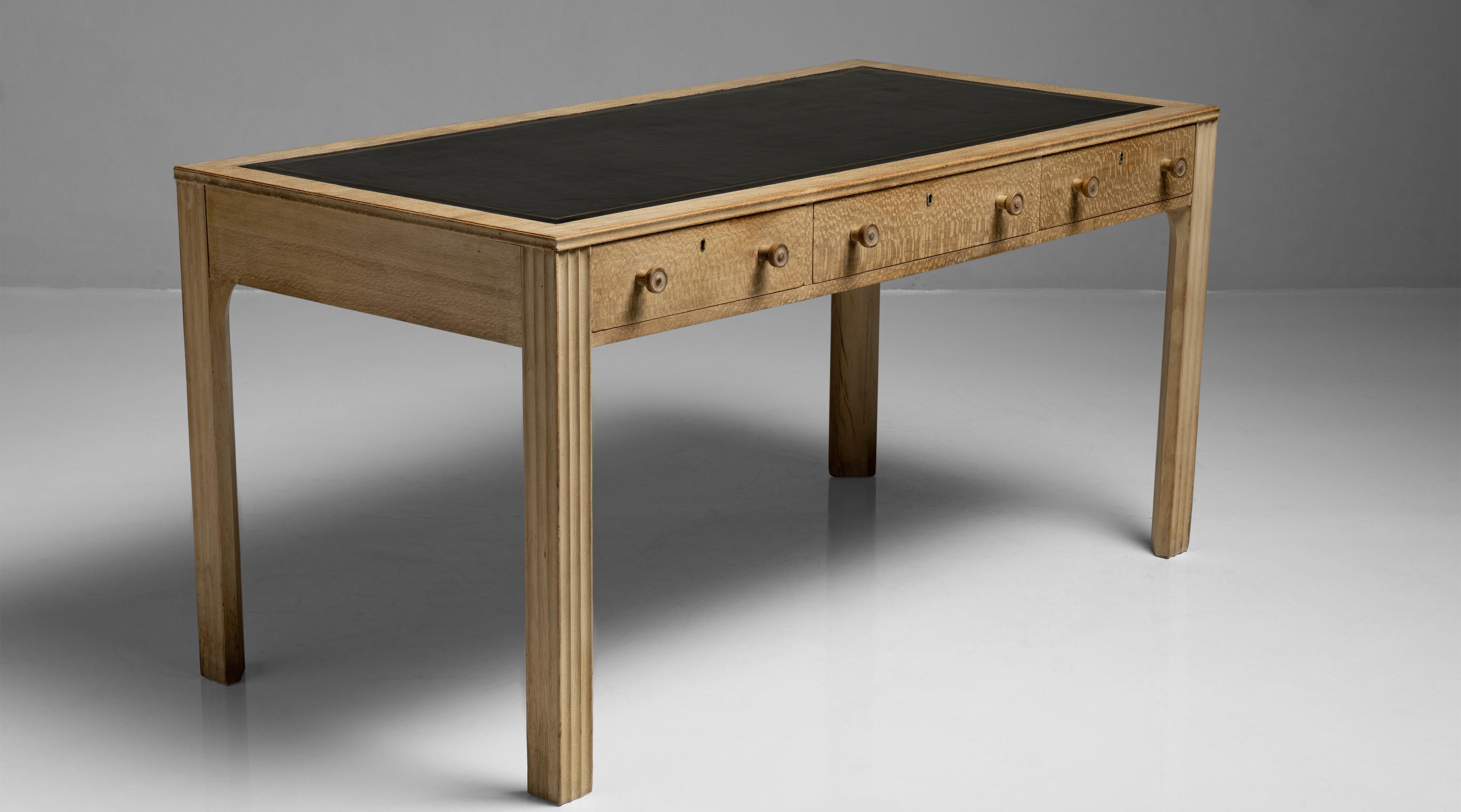 Beech & leather desk
France circa 1940

Constructed in bleached beechwood, with leather writing surface and three pullout drawers.

Measures: 59.75” W x 29.5” D x 30” H

$ 6,800.

  
