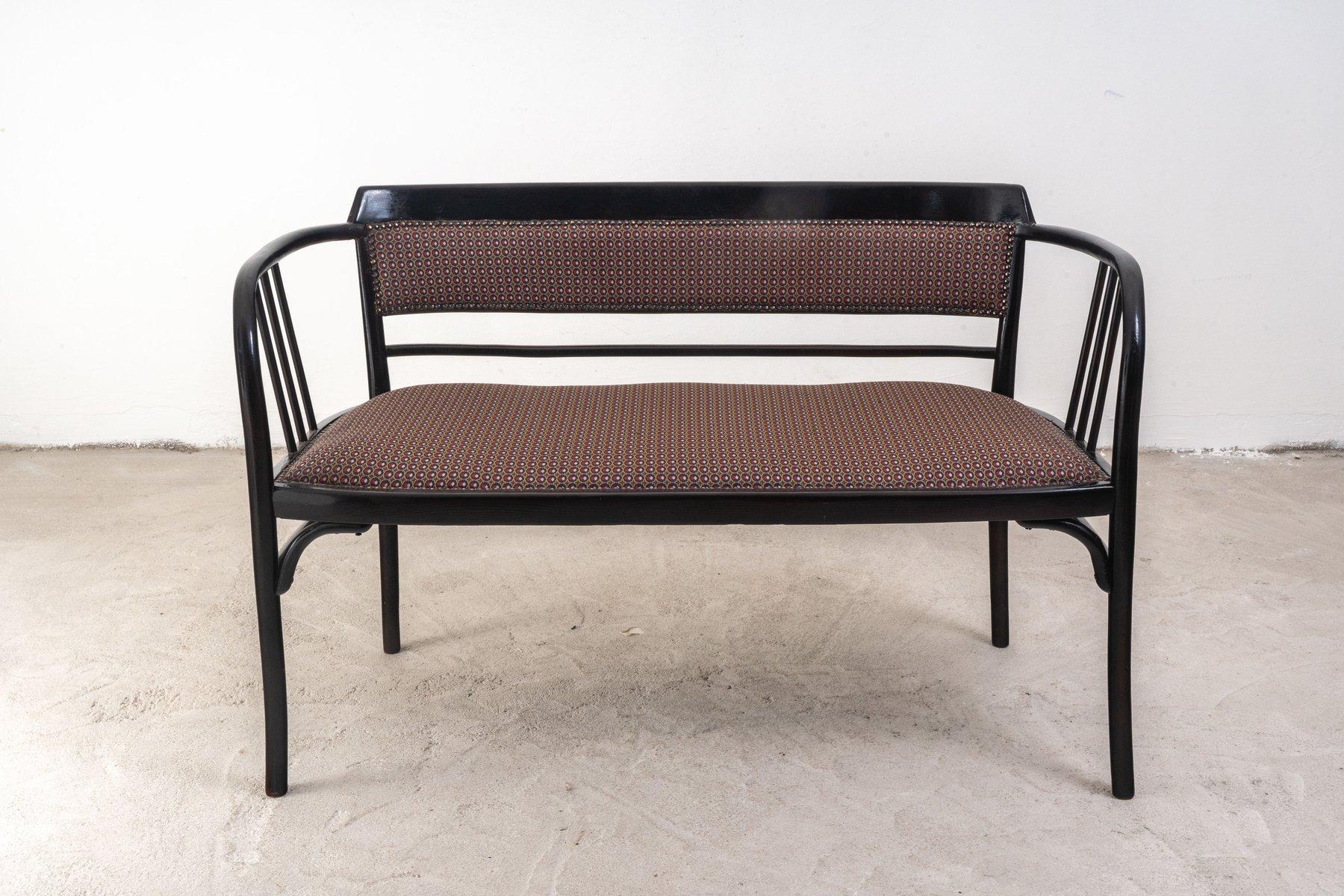 This exquisite Thonet Sofa No. 6293 is a stunning example of early 20th-century design, masterfully restored to its original splendor. Crafted from bent beech wood, the sofa features the iconic curved lines and delicate detailing that define