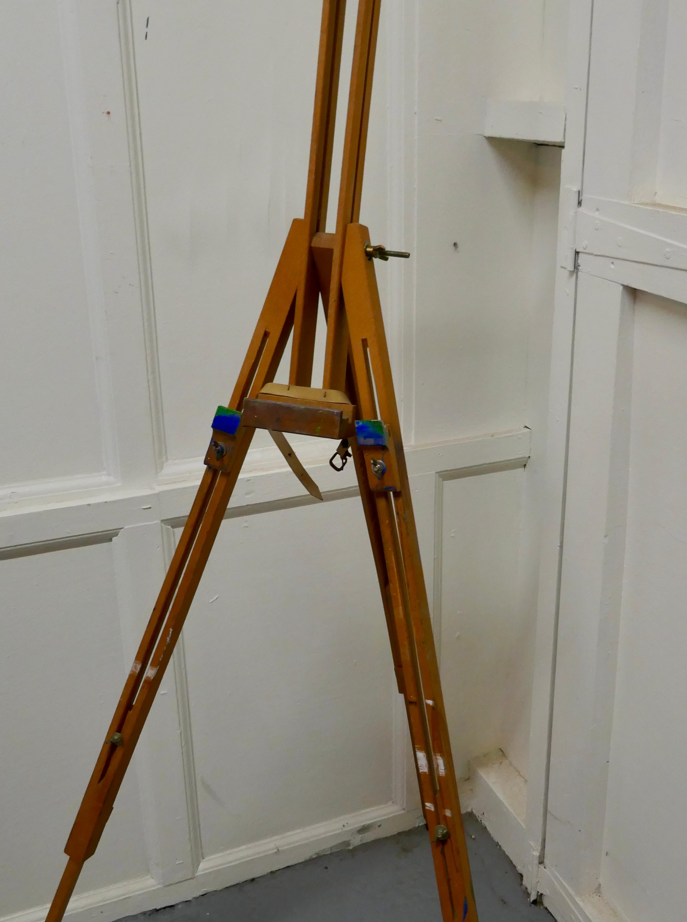 Beech portable folding Easel, 
 
The Easel height is adjustable and the picture stand can be raised and lowered according to requirements, and folds away for ease of Transport and storage
The Easel is in good used condition there are a few