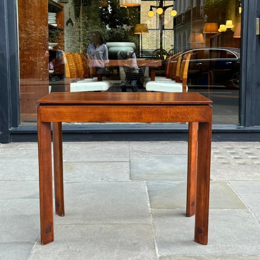 A beech table designed by Czechoslovak designer, Zbyněk Hřivnáč, during the 1970s for the Hotel Praha. 

Commissioned by the Communist Party in Czechoslovakia, construction began on the Hotel Praha in 1975. Beyond hosting the communist delegation,