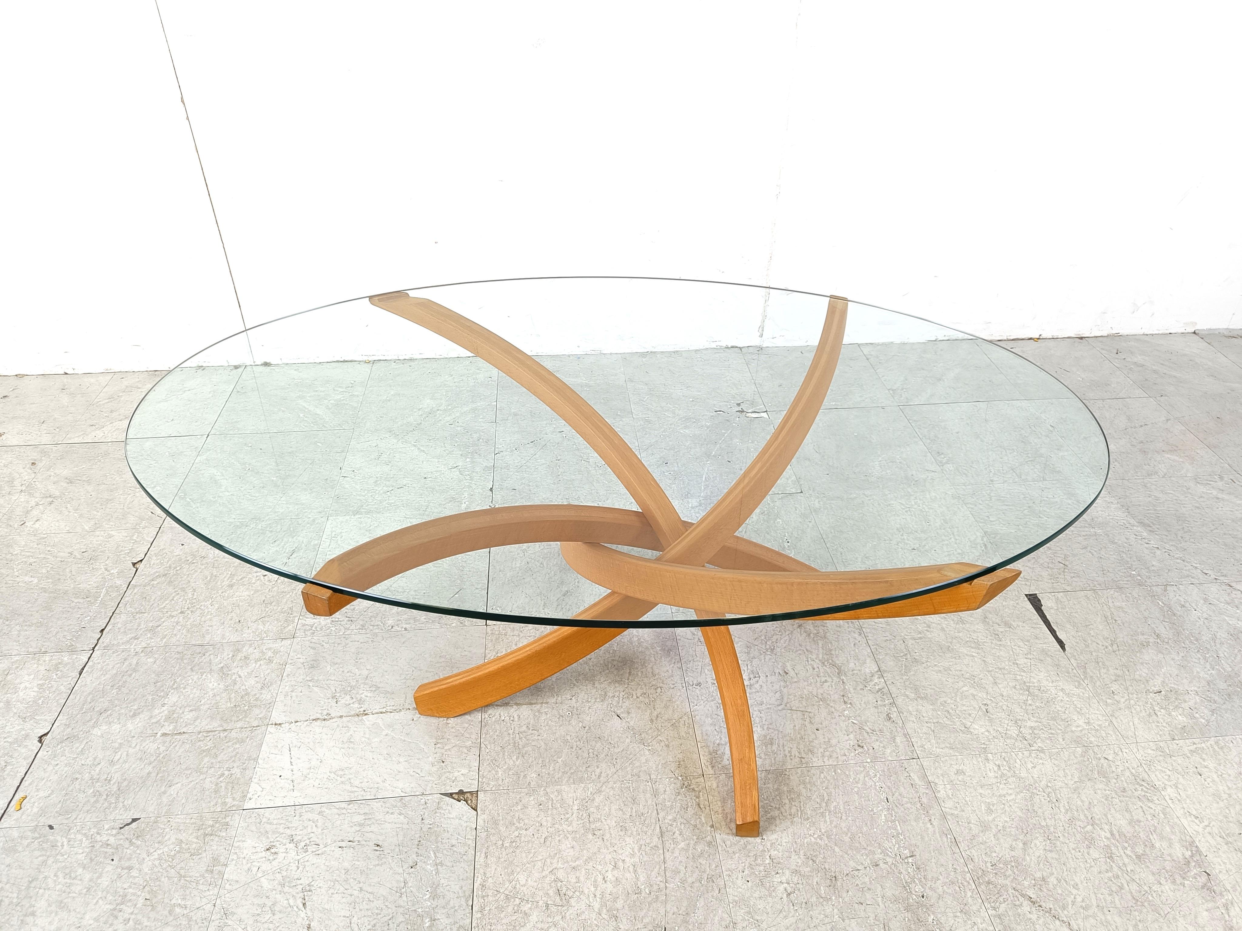 Elegant bentwood coffee table made from beech and a clear oval glass top.

Very nice timeless design.

1980s - France

Dimensions:
Height: 48cm
Lenght: 120cm
Depth: 80cm


Ref.: 452722
