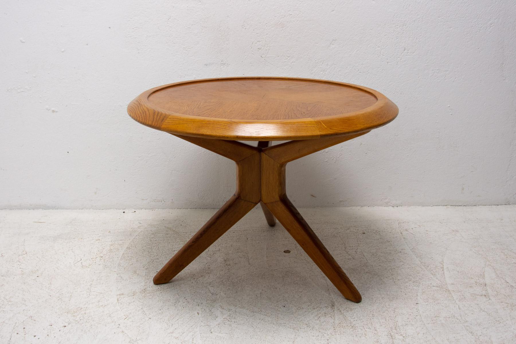 This mid century coffee table was made by Krásná Jizba company in the former Czechoslovakia in the 1950´s. It´s made of beech wood.

In excellent condition, fully renovated.

Height 62 cm

Diameter 86 cm.