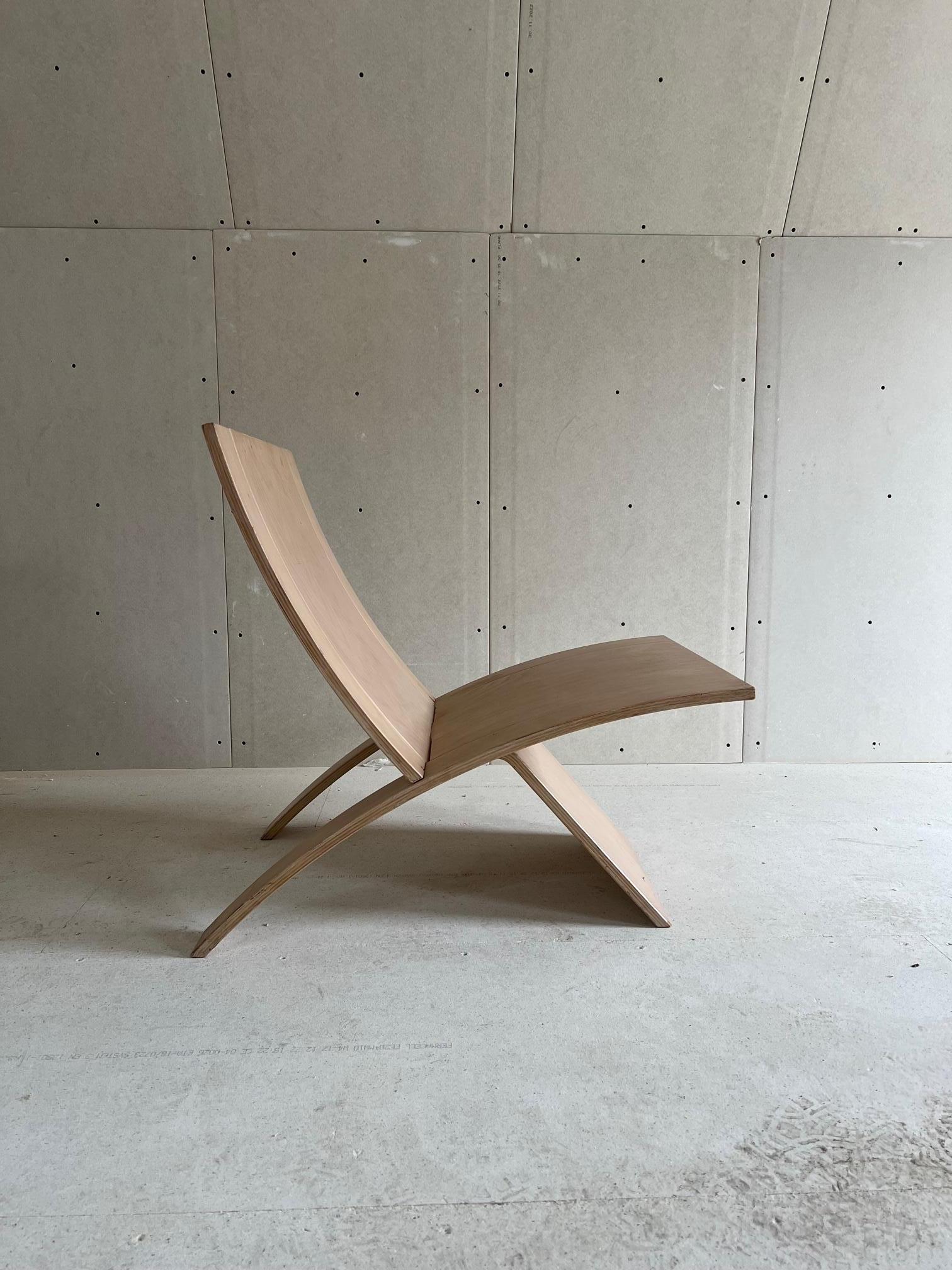 This two parted laminated beechwood chair is designed by Jens Nielsen. It's actually inspired by Wegners JH512. The minimalistic design and surprisingly comfortable sit make this chair really suitable for any room.

This lounge chair has been