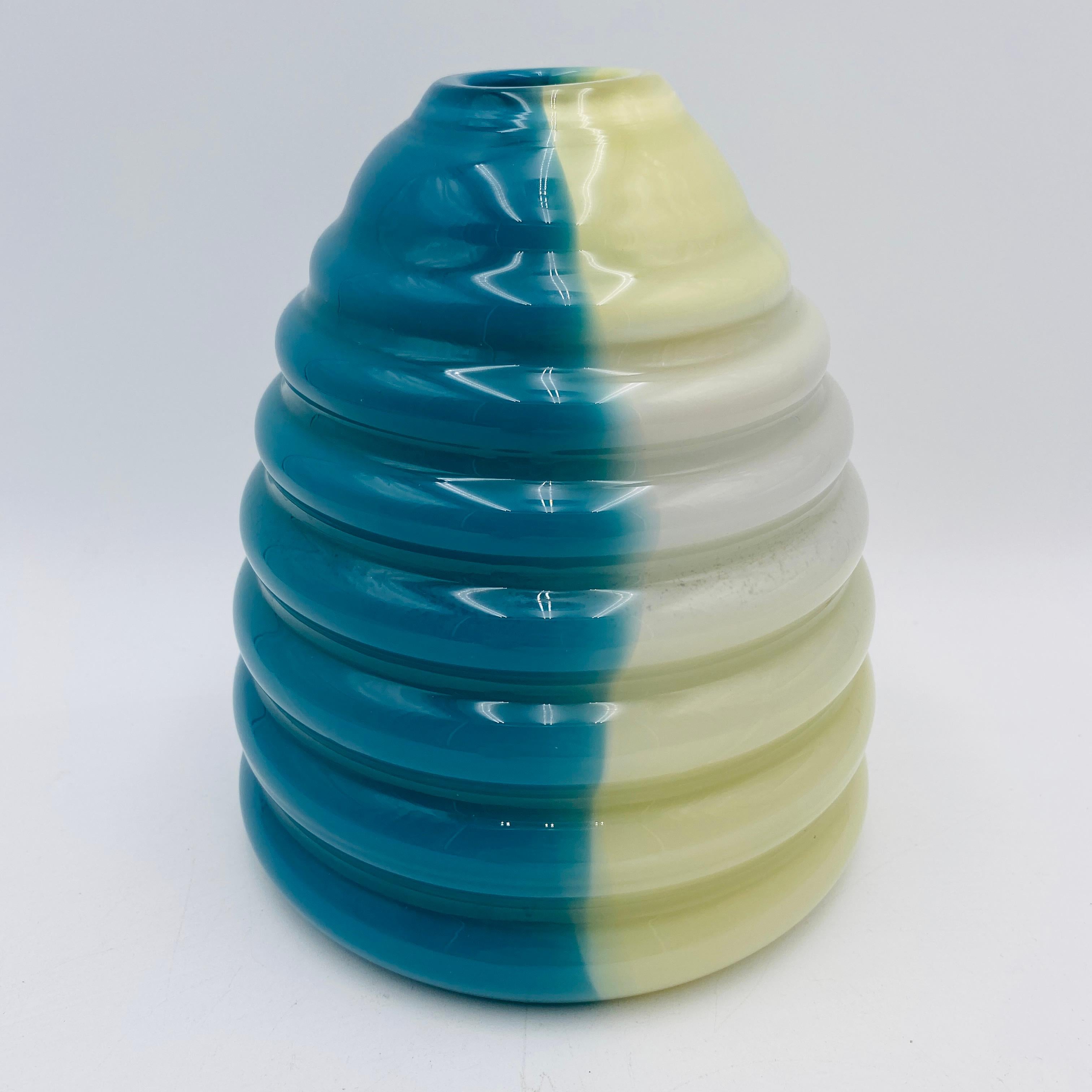 Beautiful beehive blown glass vase. The bottom is signed. 