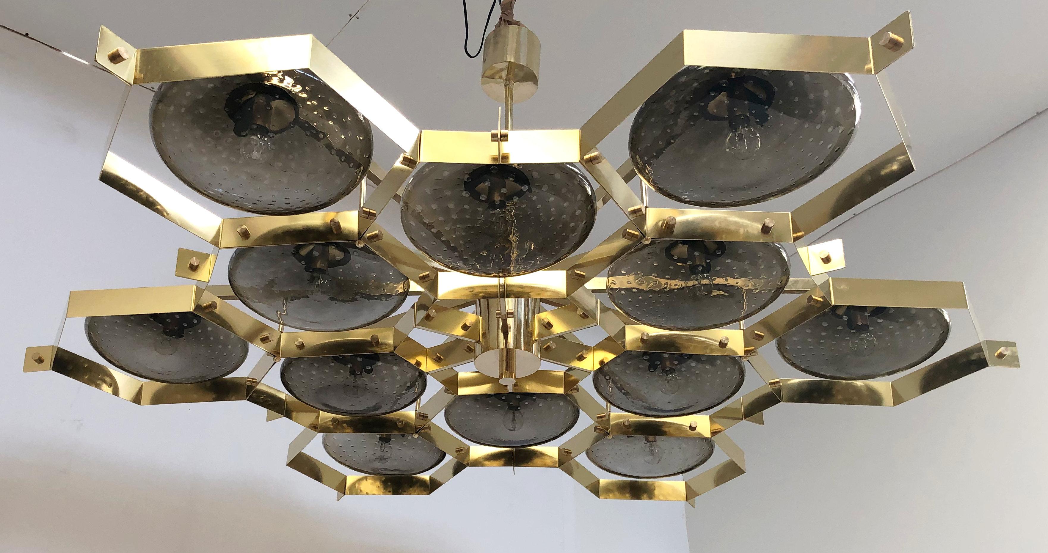 Italian chandelier with Murano glass shades mounted on solid brass frame / designed by Fabio Bergomi for Fabio Ltd / Made in Italy
12 lights / E12 or E14 type / max 40W each
Measures: Diameter 74 inches, height 30 inches
Order only / this item ships