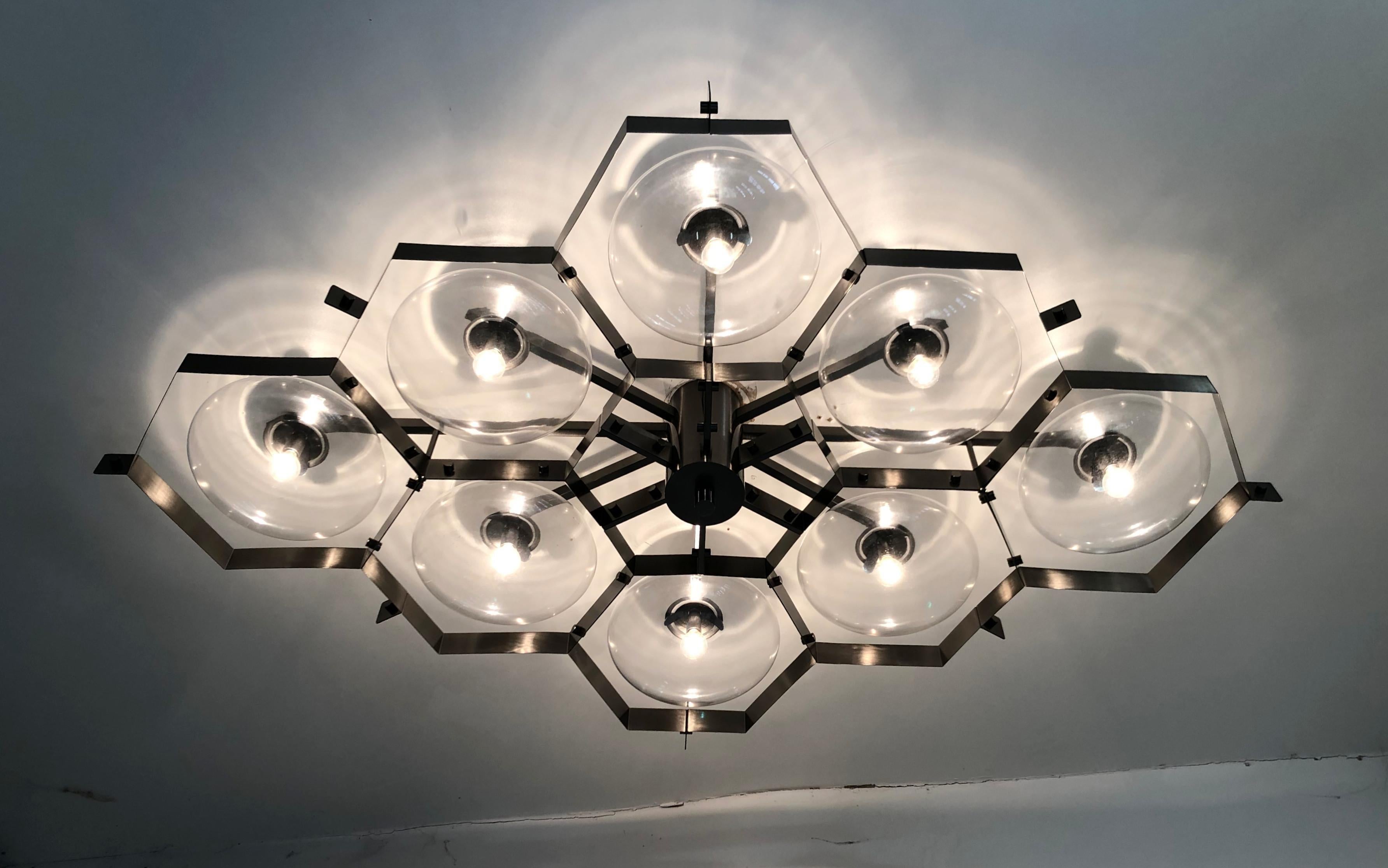 Italian flush mount with Murano glass shades mounted on solid brass frame / Made in Italy
Designed by Fabio Ltd, inspired by Angelo Lelli and Arredoluce styles
8 lights / E12 or E14 type / max 40W each
Length: 69 inches / Width: 46.5 inches /