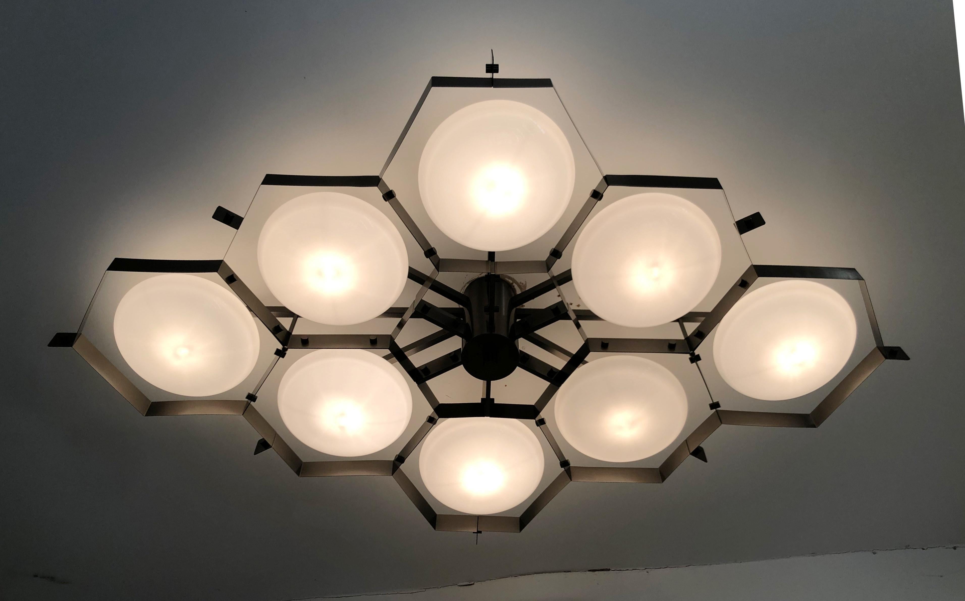 Italian flush mount with Murano glass shades mounted on solid brass frame / Made in Italy
Designed by Fabio Ltd, inspired by Angelo Lelli and Arredoluce styles
8 lights / E12 or E14 type / max 40W each
Length: 69 inches / Width: 46.5 inches /