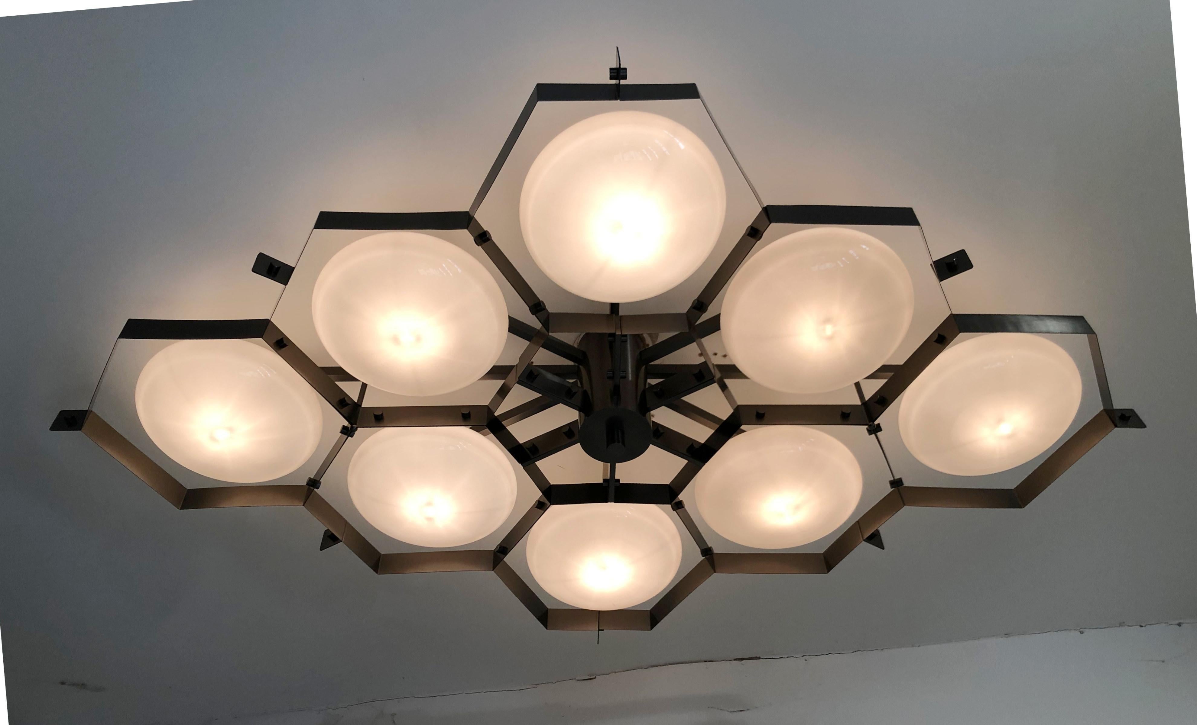 Italian flush mount with Murano glass shades mounted on solid brass frame / Made in Italy
Designed by Fabio Ltd, inspired by Angelo Lelli and Arredoluce styles
8 lights / E12 or E14 type / max 40W each
Length: 69 inches / Width: 46.5 inches /