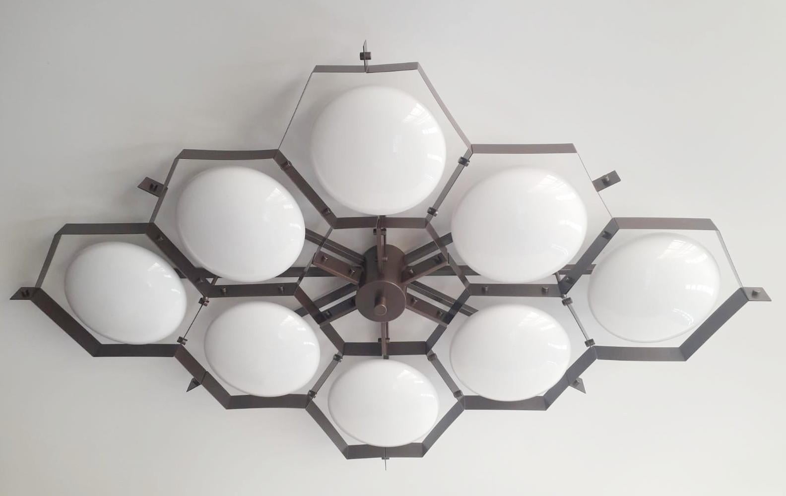 Italian flush mount with Murano glass shades mounted on solid brass frame / Made in Italy
Designed by Fabio Ltd, inspired by Angelo Lelli and Arredoluce styles
8 lights / E12 or E14 type / max 40W each
Length: 69 inches / Width: 46.5 inches /