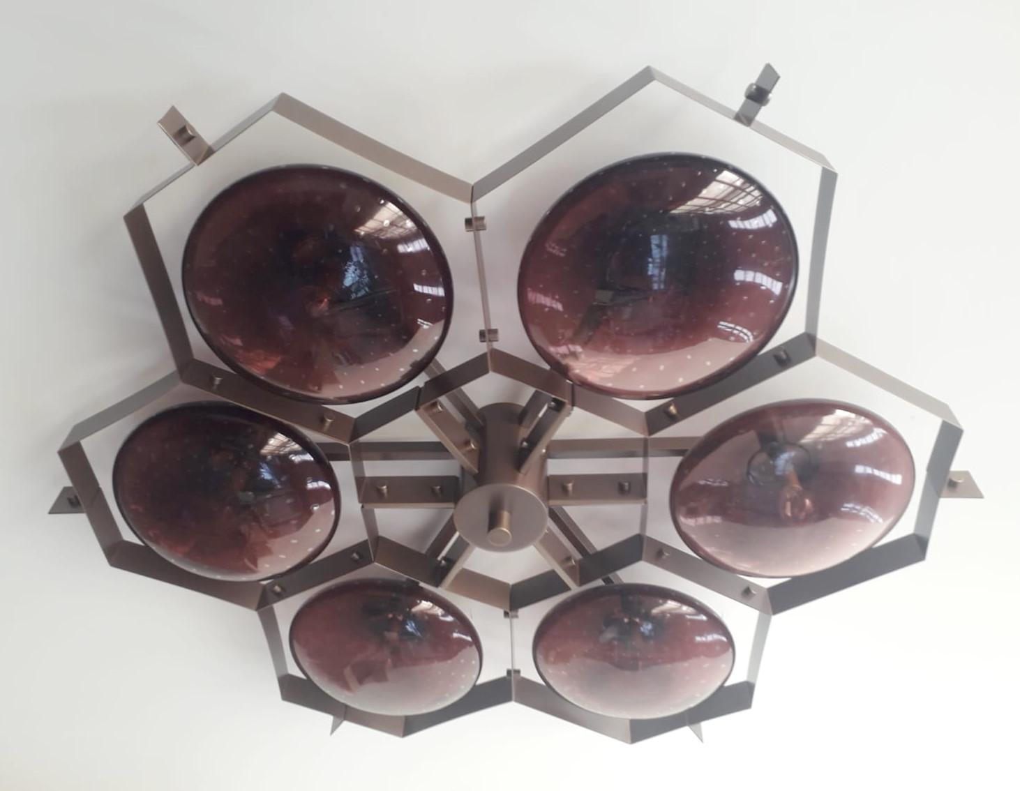 Italian flush mount with Murano glass shades mounted on solid brass frame / Made in Italy
Designed by Fabio Ltd, inspired by Angelo Lelli and Arredoluce styles
6 lights / E12 or E14 / max 40W each
Measures: Diameter 47 inches, height 10 inches
Order