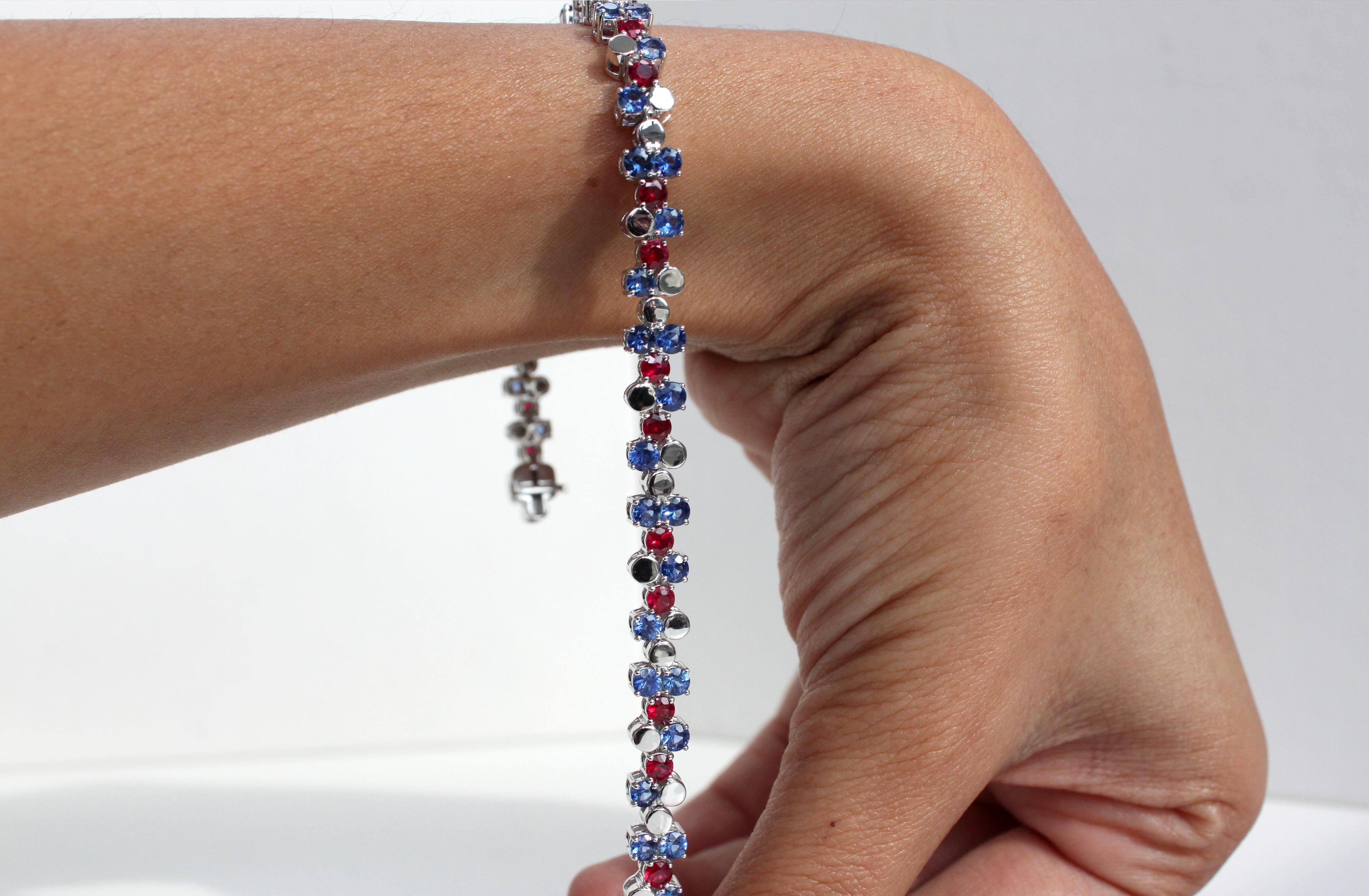 Total Weight: 18.49g
Total Gemstone Weight: 6.48ct (ruby 2.15ct  blue sapphire 4.33ct)
Bracelet Length: 18 cm
Bracelet Width: 0.6cm

Introducing our one-of-a-kind Natural Gemstone Bracelet, a true masterpiece inspired by the intricate design of a