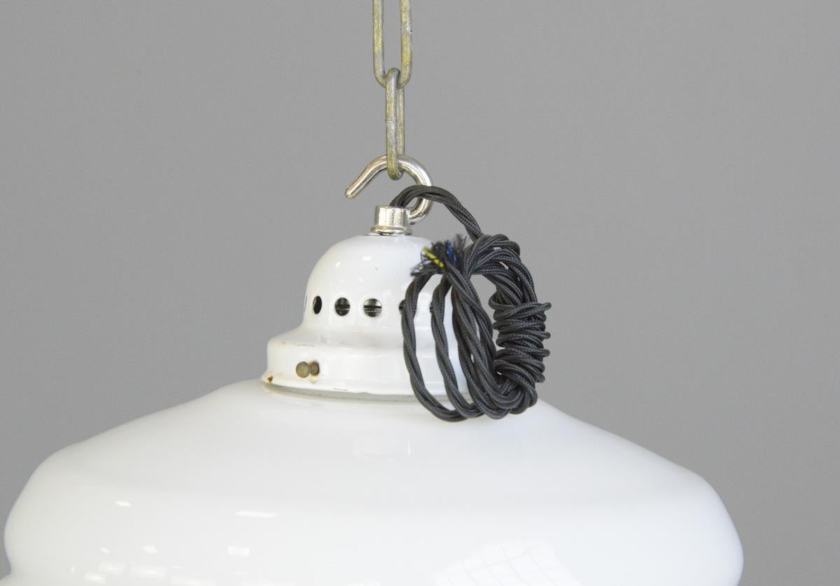 Beehive opaline light, circa 1930s

- White opaline glass with white enamel galleries
- Beautiful beehive design
- Dutch, 1930s
- Measure: 28cm wide x 28cm tall

Opaline glass lighting

Opaline glass lighting provides a soft, warm glow and