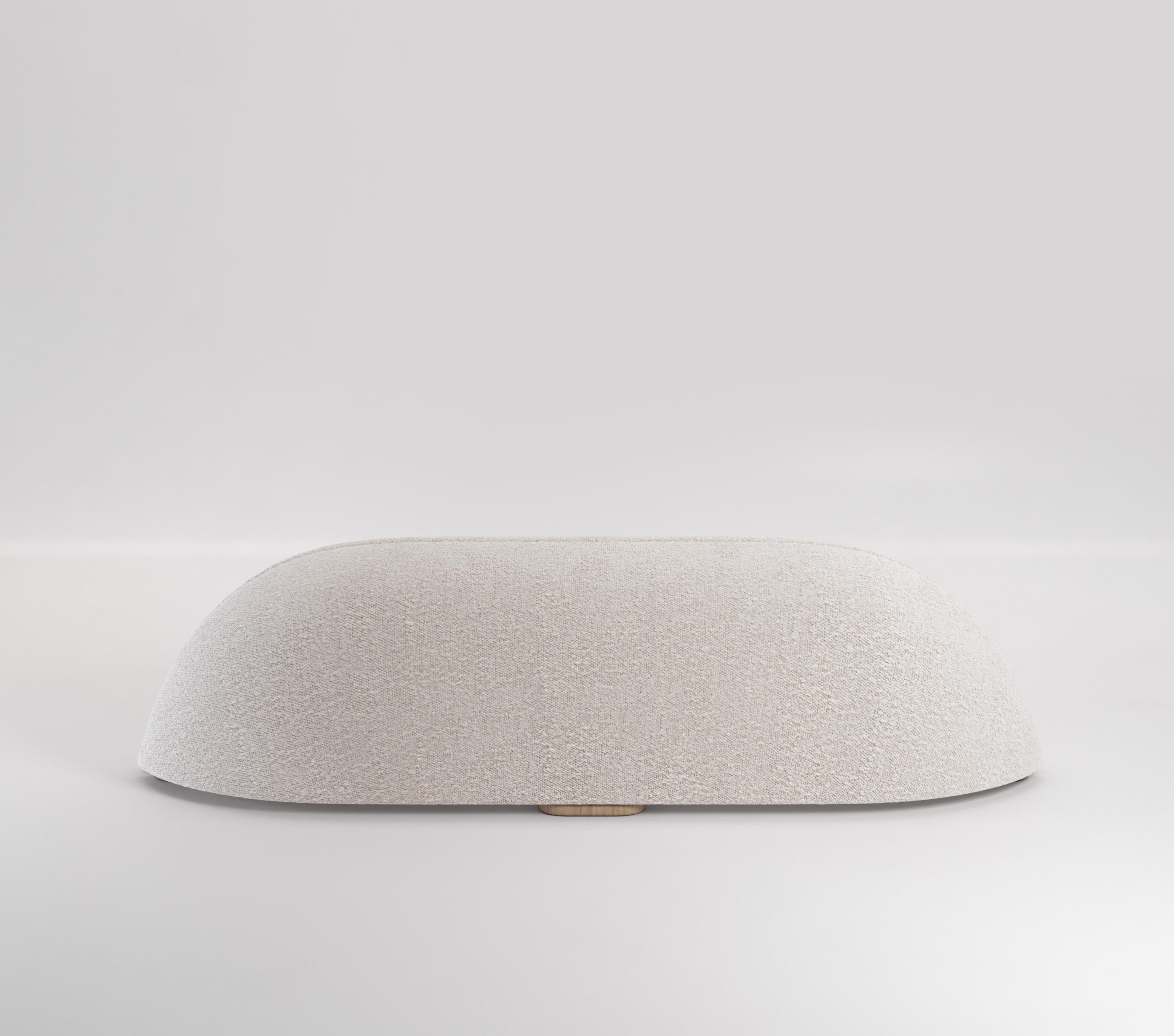 The Beetle bench is a soft and inviting bench perfect for a living space, bedroom or hallway. The unique shape of Beetle is where it takes its name, finished with only a large seam down the middle of the piece making it seem like two separate halves