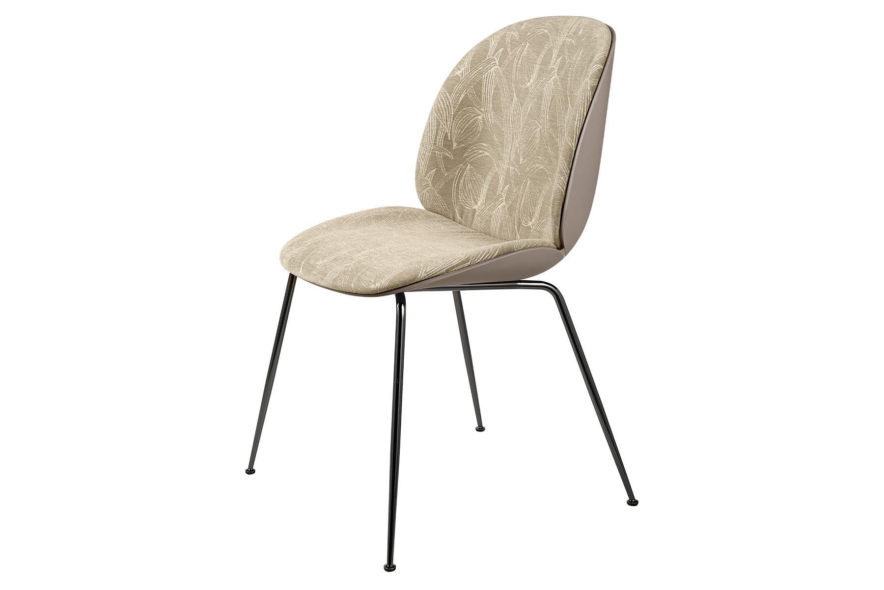 Looking closely at the anatomy of the beetle insect, characterized by its solid outside and soft inside, the front upholstered Beetle Chair possesses all attributes. The front upholstered Beetle Chair holds the same soft core as the fully