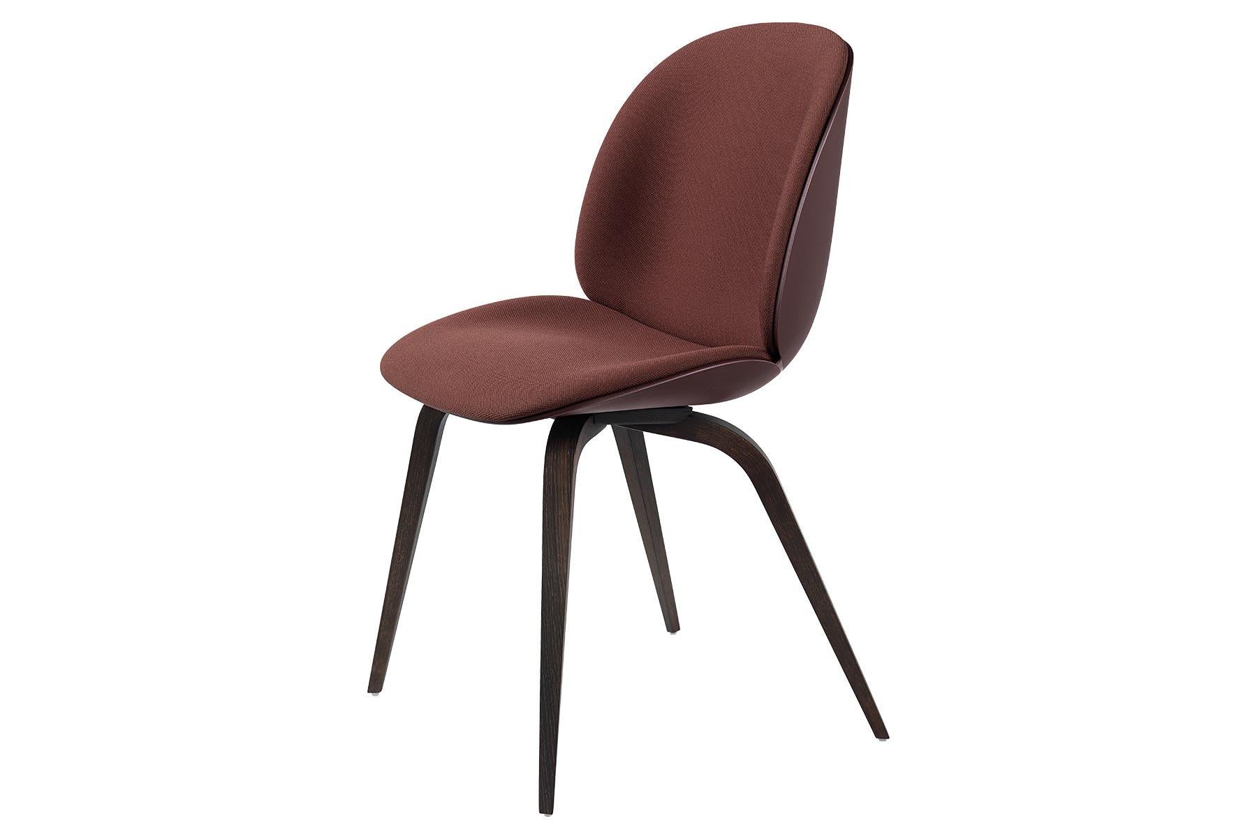 Looking closely at the anatomy of the beetle insect, characterized by its solid outside and soft inside, the front upholstered Beetle chair possesses all attributes. The front upholstered Beetle chair holds the same soft core as the fully