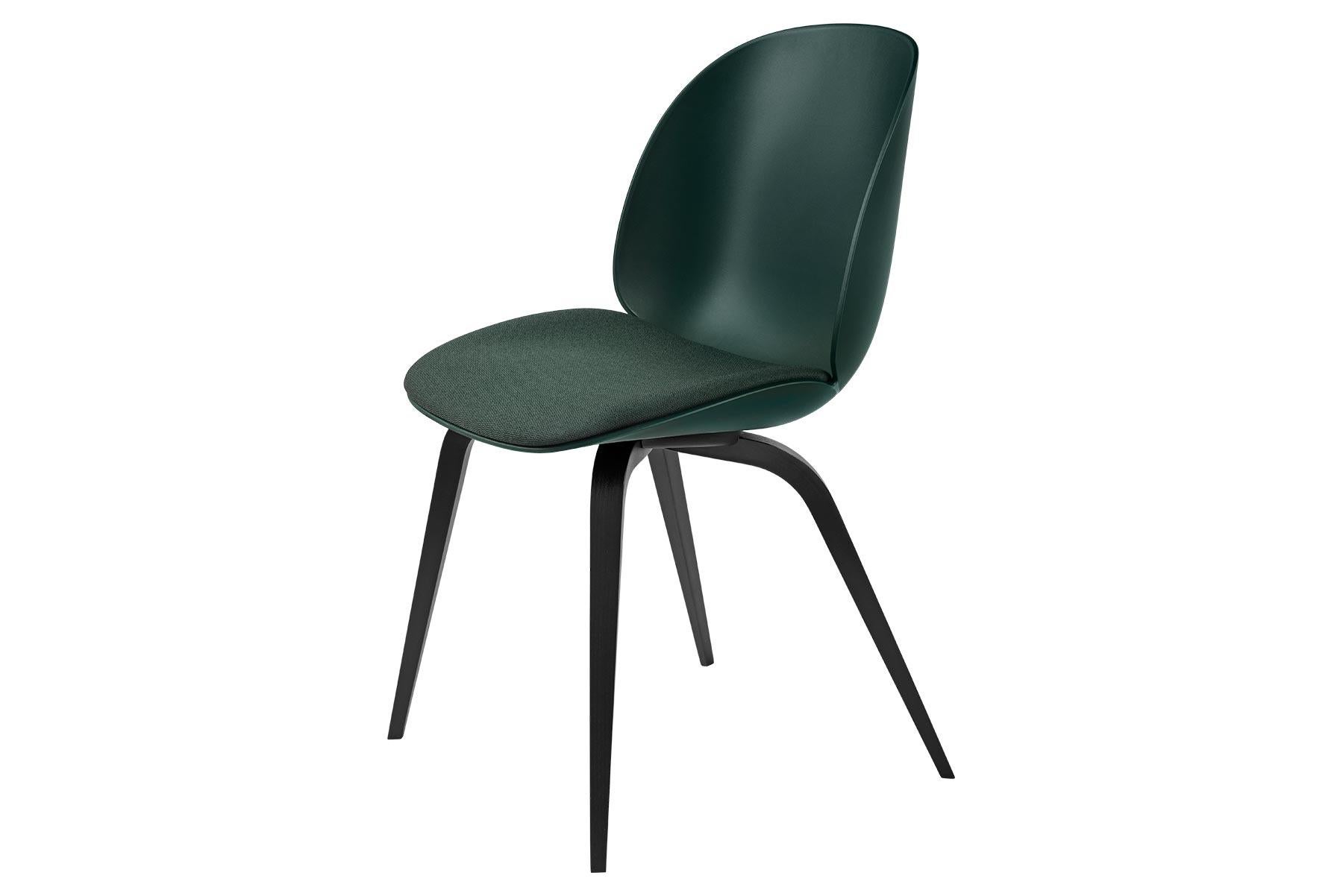 Looking closely at the anatomy of the beetle insect, characterized by its solid outside and soft inside, the front upholstered Beetle chair possesses all attributes. The front upholstered Beetle chair holds the same soft core as the fully