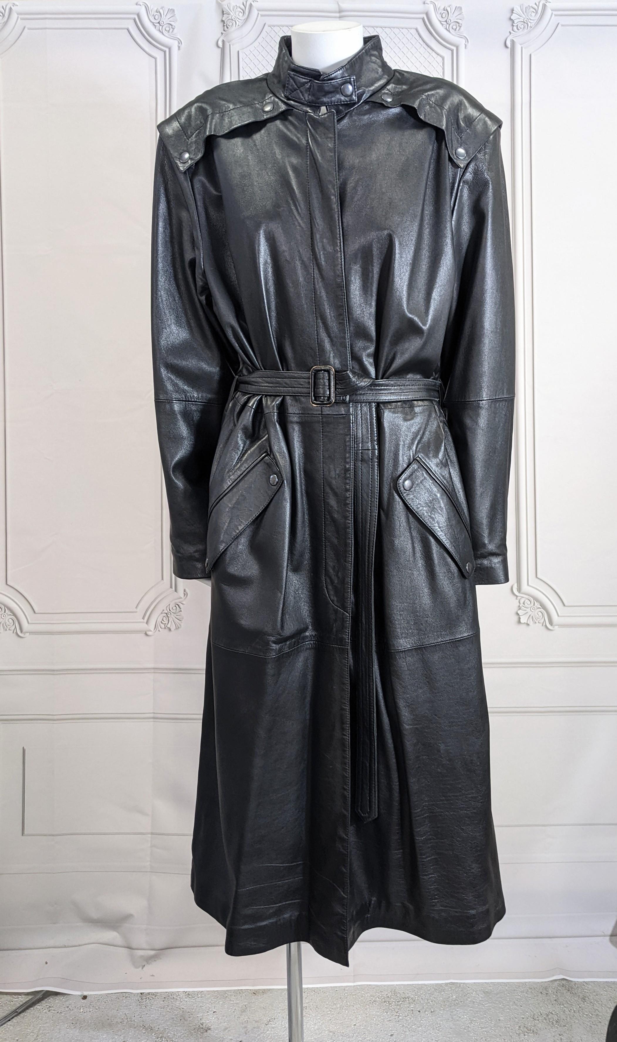 Cool Beged-Or Leather Moto Coat from the 1980's. Oversized cut, sized 12 womens is suitable for men's Medium as well. Balenciaga proportions with large extended shoulders, long sleeves, and super long belt and ample cut. 
Soft calf leather with