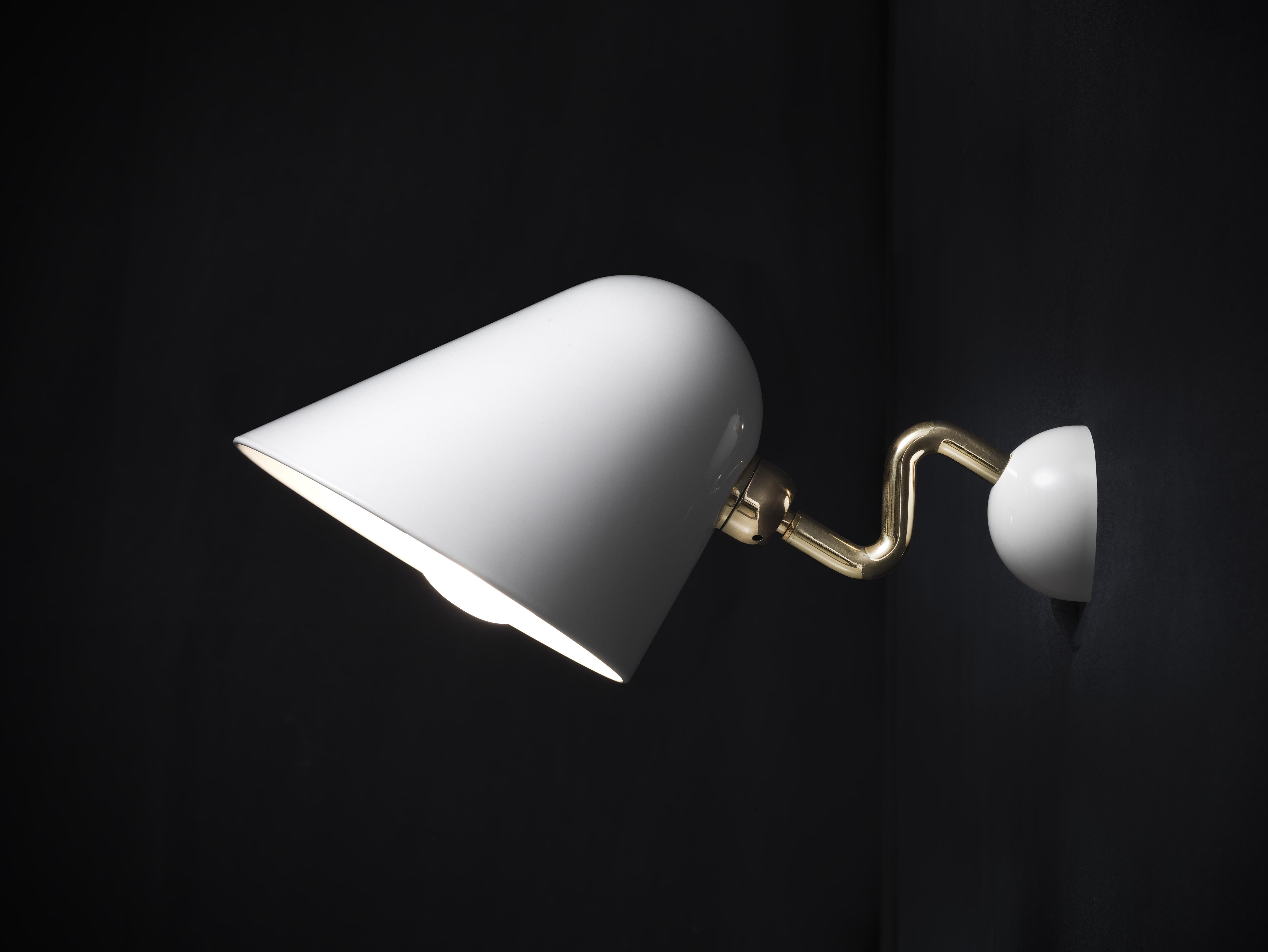 Beghina applique sconce in white and brass for Tato Italia. 

Designed by Giulia e Guido Guarnieri in 2011 for Tato Italia. The Beghina Applique awakens the old pleasure of a candleholder. The welded brass tubes forms an elegant intersection with
