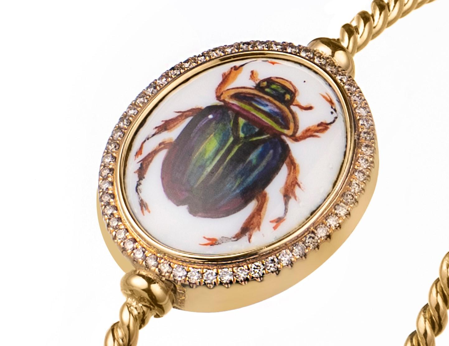 14K Yellow Gold
Hand-painted Enamel Scarabs
0.20ct brilliant-cut Champagne Diamonds
Scarab measurements: 1.8cm wide, 2cm tall

The Scarab speaks BEGIN, the Heavenly Cycle, Rebirth, One’s Own Journey.