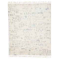 Abstrakter moderner Wollteppich im marokkanischen Stil in Beige