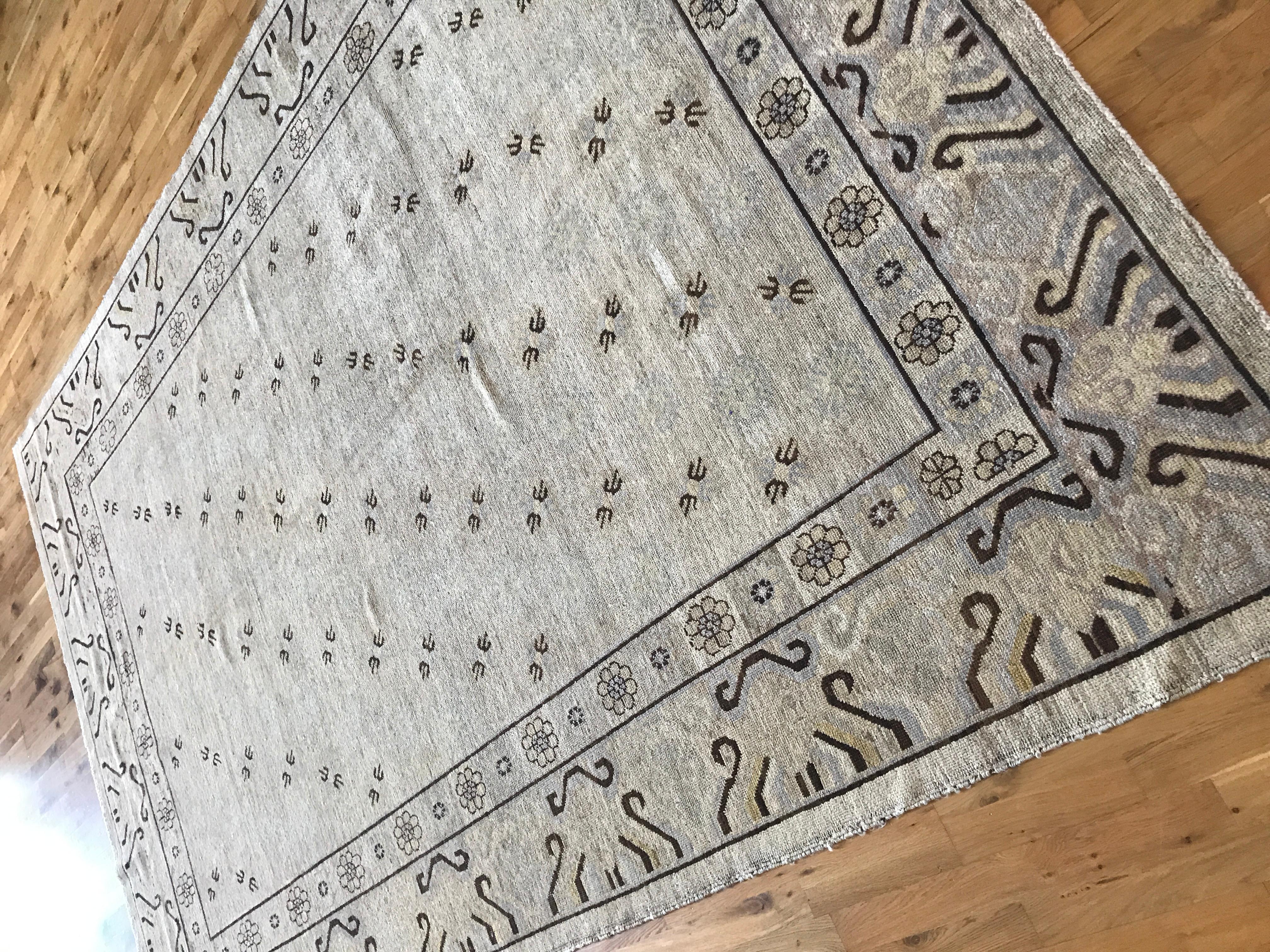 Contemporary Beige and Brown Khotan Area Rug
