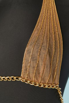 Beige and gold tulle bra with gold metal chain