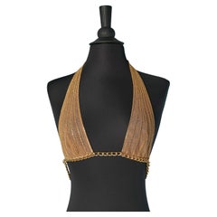 Beige and gold tulle bra with gold metal chain