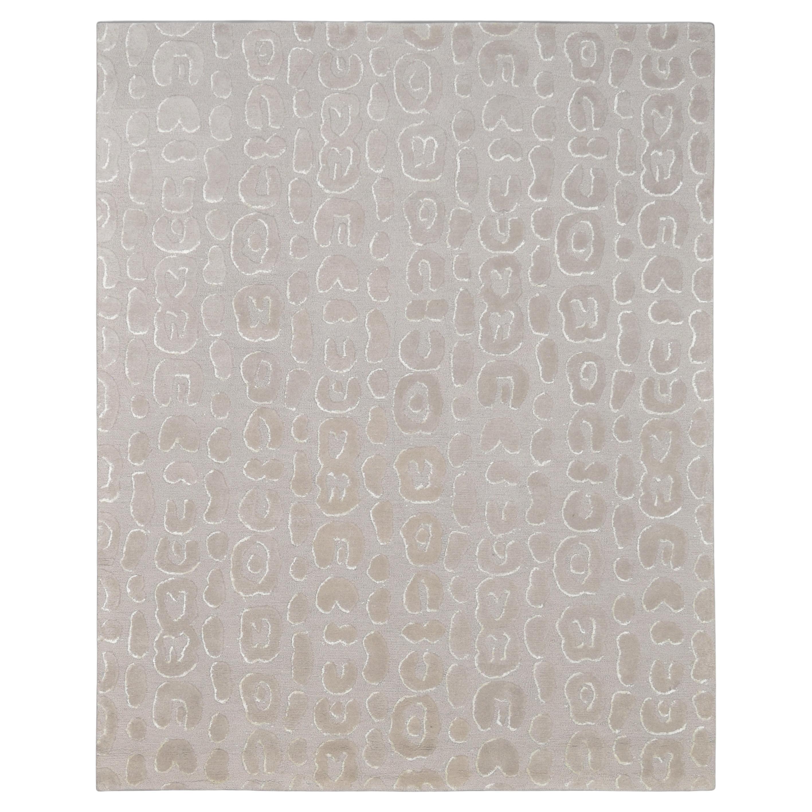 Dessin de léopard abstrait beige et ivoire  Tapis de laine 8'x10'