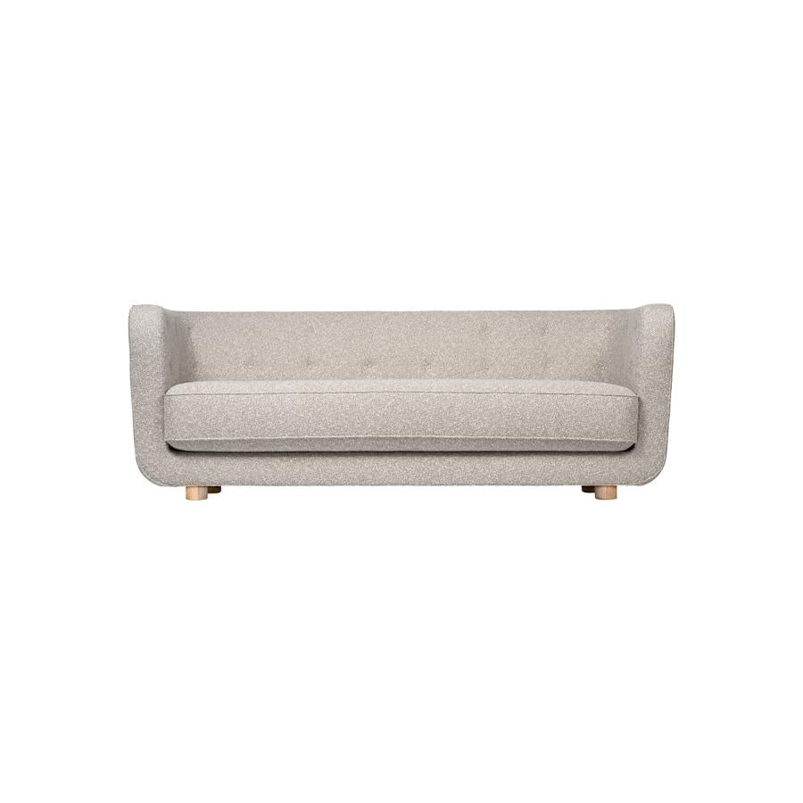 Beige and natural oak Sahco Nara Vilhelm sofa by Lassen
Dimensions: W 217 x D 88 x H 80 cm 
Materials: Textile, oak.

Vilhelm is a beautiful padded three-seater sofa designed by Flemming Lassen in 1935. A sofa must be able to function in several