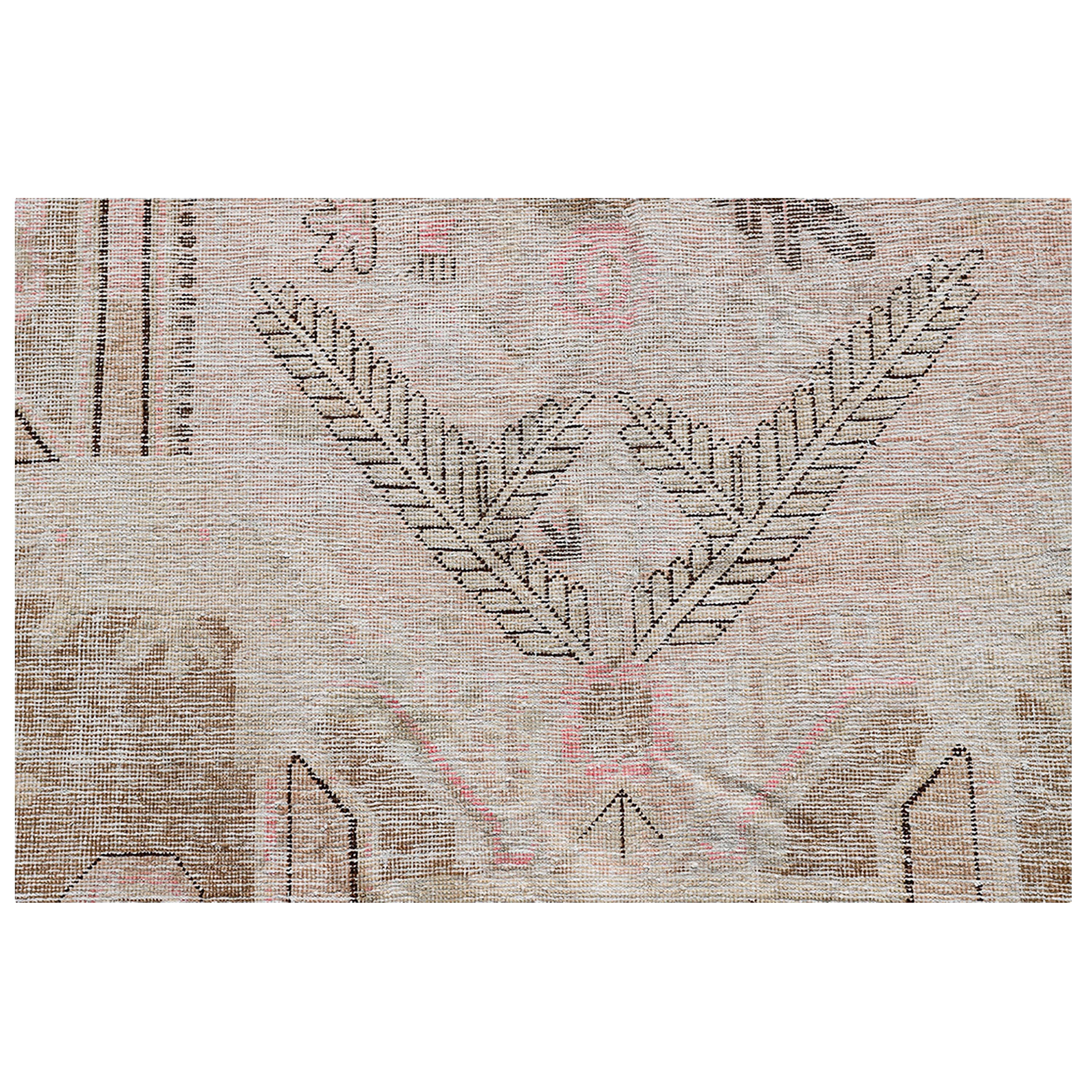 Sourced from the ancient Silk Road to bring a genuine one-of-a-kind rug to your home, this Beige and Pink Vintage Wool Cotton Blend Rug - 5'5