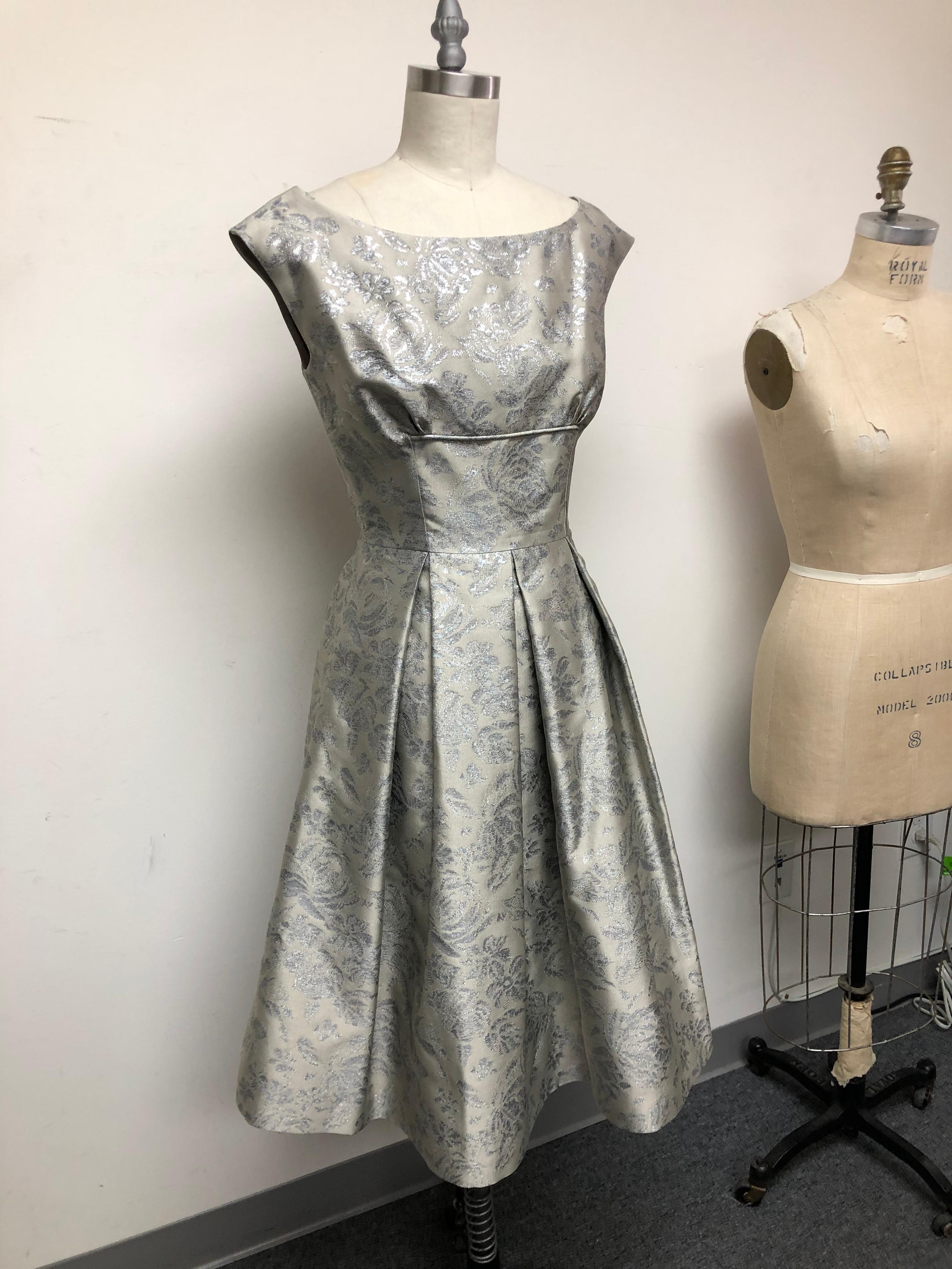 Fit and Flare French Brocade in Beige and  Sparkling Silver abstract floral is perfect for Spring into Summer. Wear this dress to weddings and parties and you will see how it shines. The dress is 
both timeless and chic. The lovely neckline and