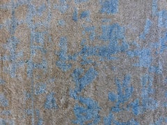 Beige and Turquoise Abstract Area Rug
