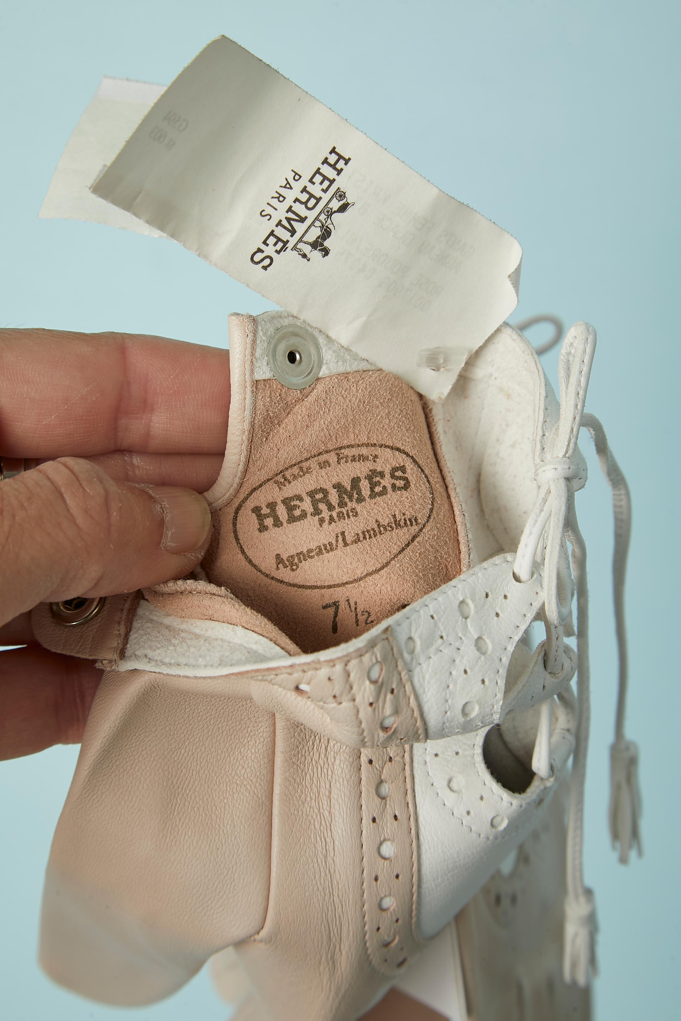 Women's Beige and white leather gloves with cut-work, leather laces and pompom Hermès  For Sale