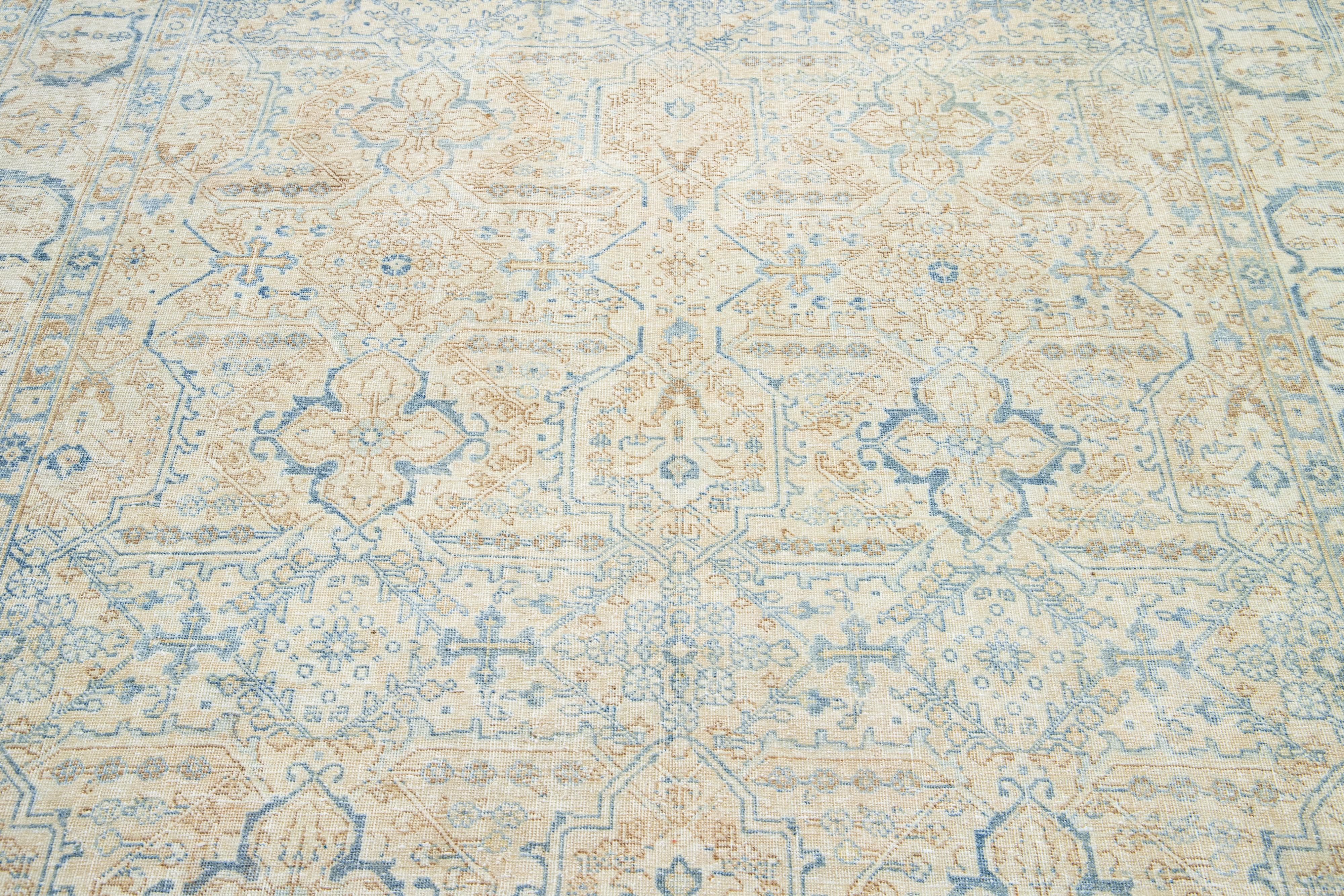 Early 20th Century Beige Antique Persian Heriz Wool Rug Featuring an Allover Design For Sale