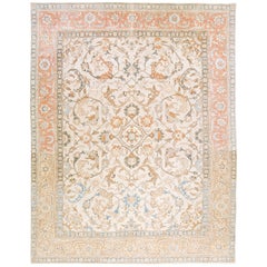 Tappeto in lana beige antico Tabriz persiano fatto a mano con medaglione e motivo floreale