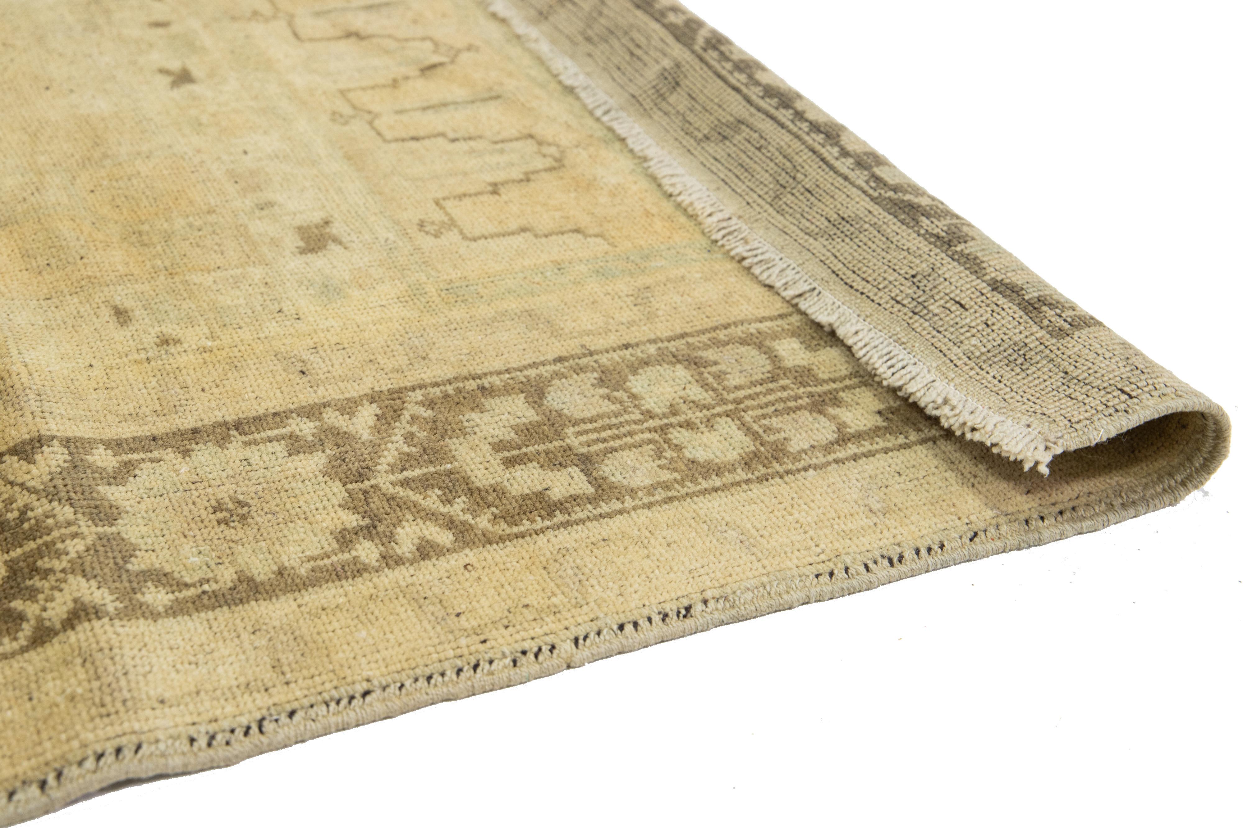 Hand-Knotted Beige Antique Turkish Khotan Wool Rug Handmade with Center  Motif For Sale