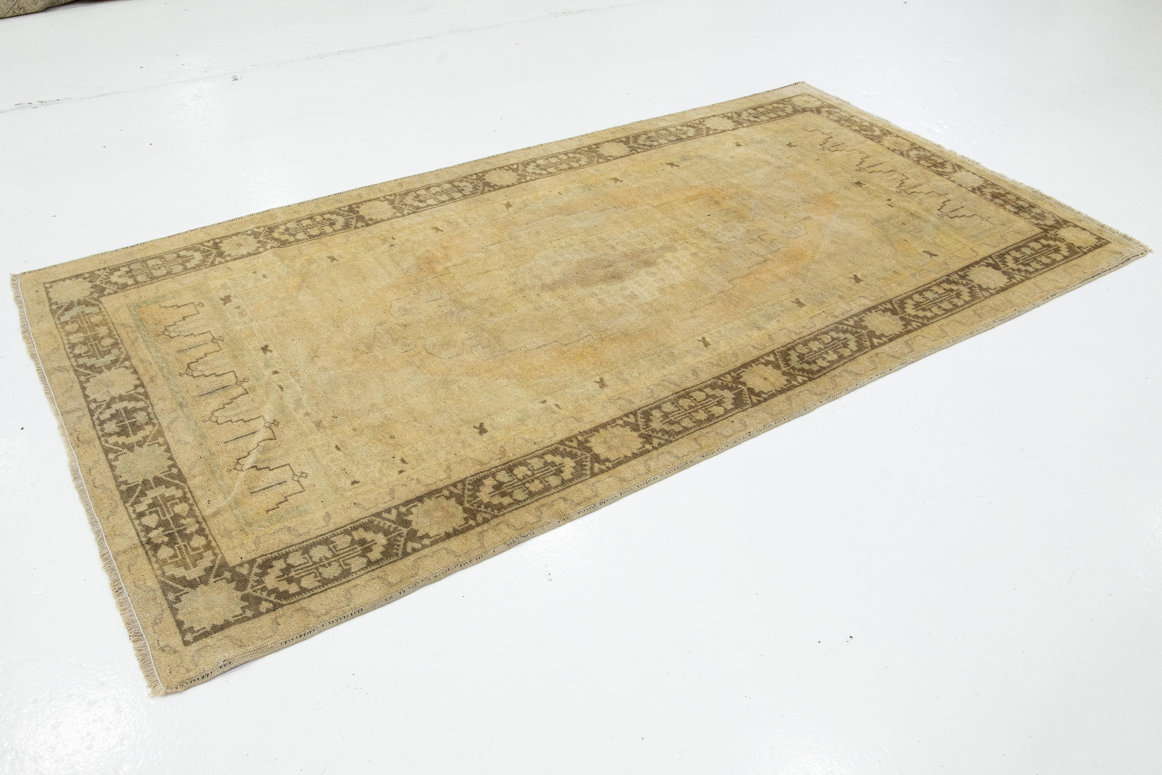 Beige Antique Turkish Khotan Wool Rug Handmade with Center  Motif In Good Condition For Sale In Norwalk, CT