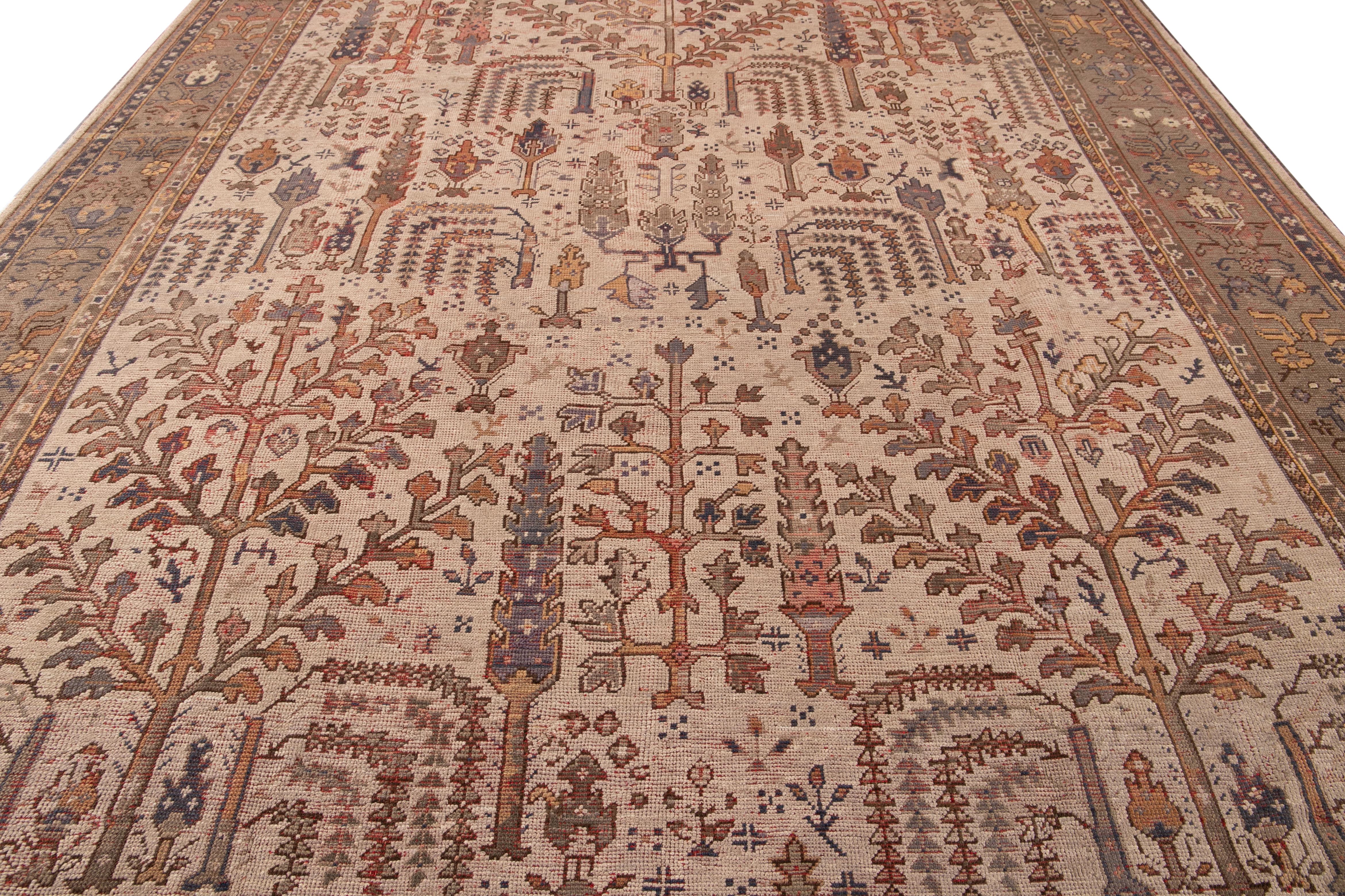 Hand-Knotted Beige Antique Turkish Oushak Handmade Oversize Wool Rug with Allover Pattern For Sale