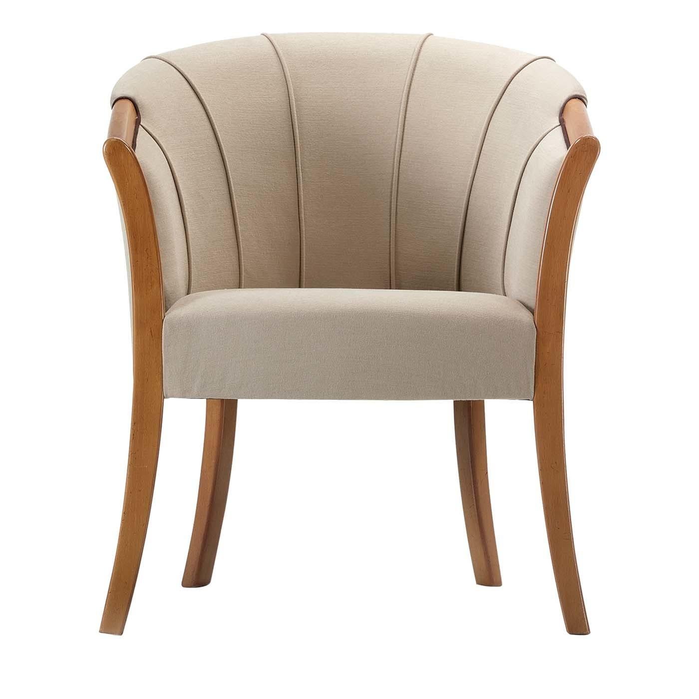 Custom made by skilled artisans, this lovely armchair combines Classic and contemporary design for a luxurious style. Shown here in beige with wooden legs, it can be personalized according to the customer's needs. The modern and elegant design makes