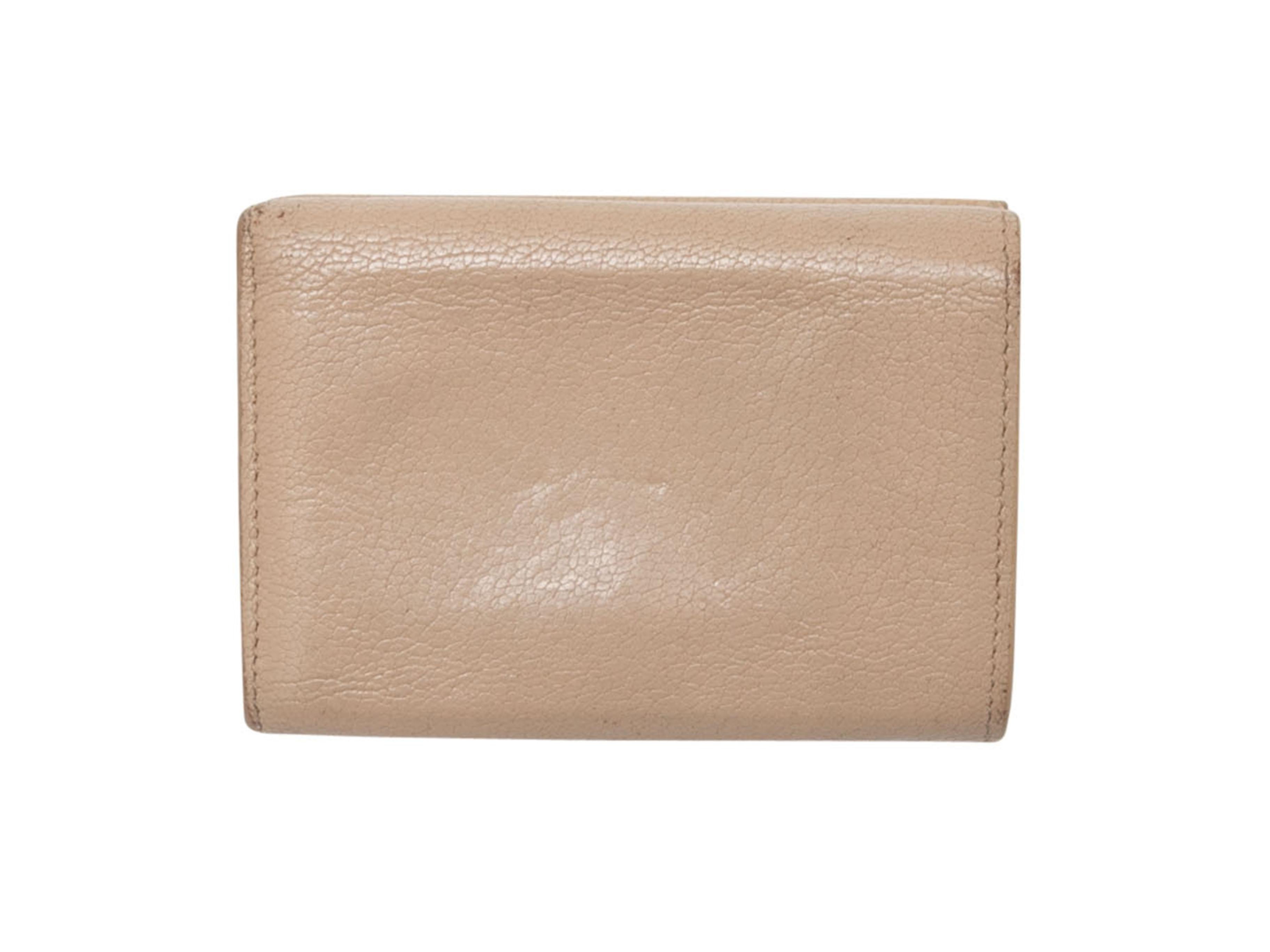 Beige Neo Classic Mini leather wallet by Balenciaga. Gold-tone hardware. Interior card and cash slots. Exterior zip pocket. 3