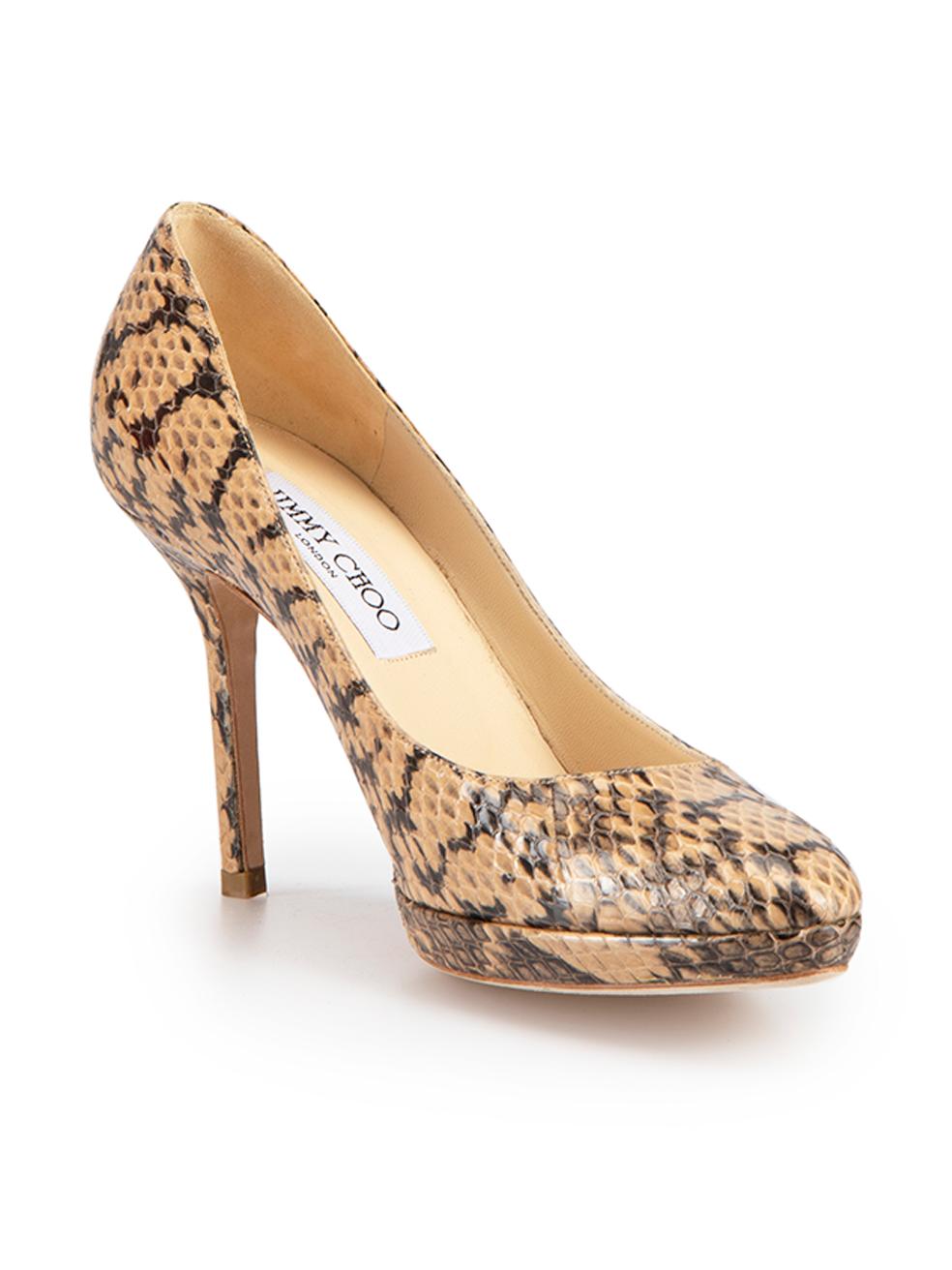 CONDITION is Very good. Minimal wear to shoes is evident. Minimal wear to left shoe with scuff to the heel-stem and mark to the right-side on this used Jimmy Choo designer resale item.



Details


Beige & black

Snakeskin

Slip-on