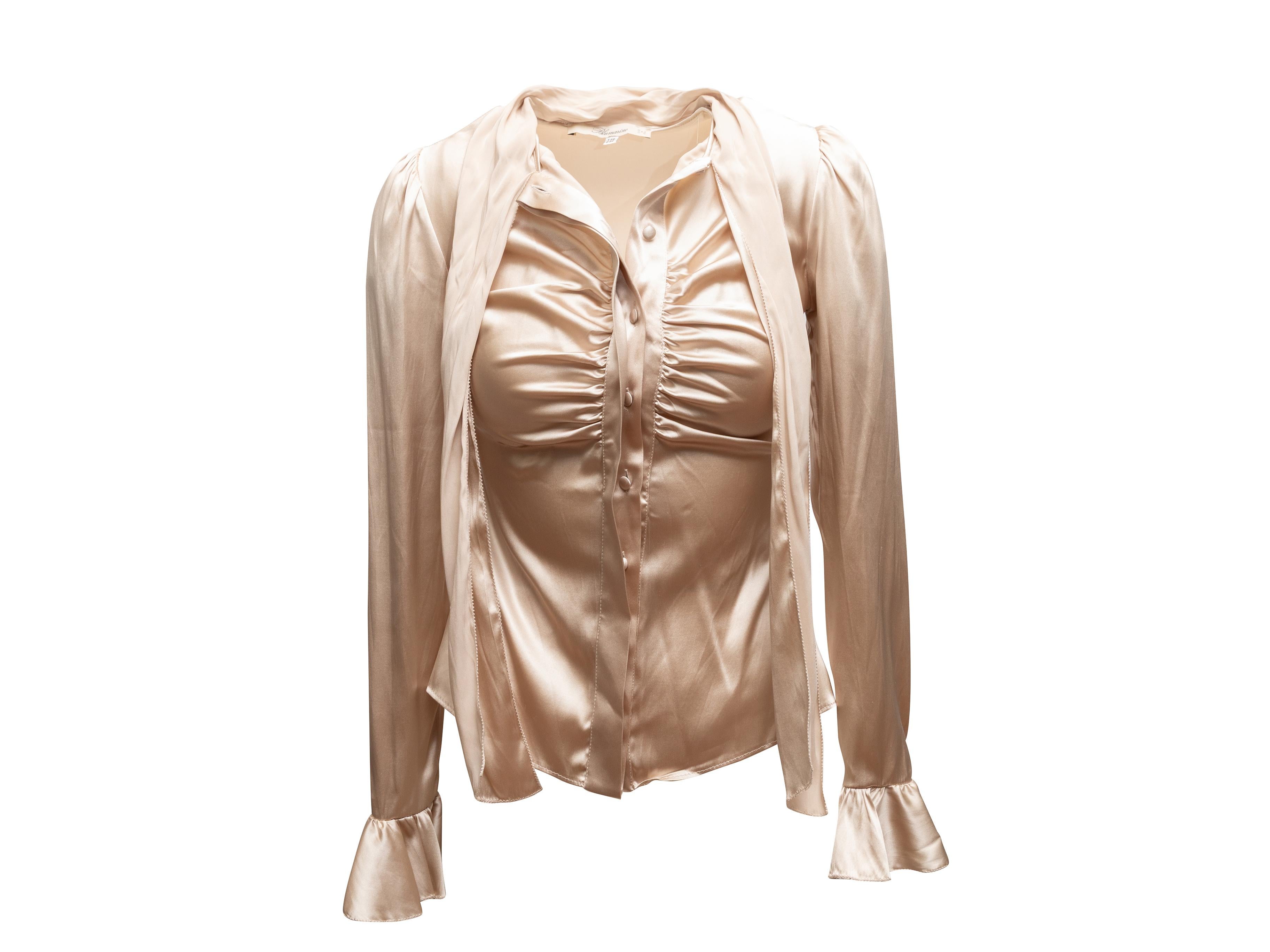 Blusa de seda beige de manga larga de Blumarine. Pajarita en el cuello. Fruncido en el corpiño delantero. Cierre de botones delante. 31,5