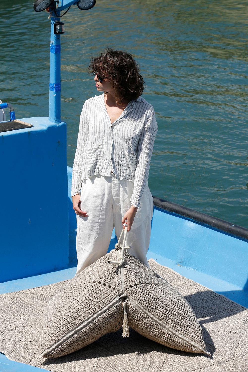 The Classic crochet granny square takes a contemporary twist in this large floor cushion. Four squares form the cushion which are than sewn together with bespoke outdoor webbing. It explores the aesthetics of nomads and wants to live both inside and