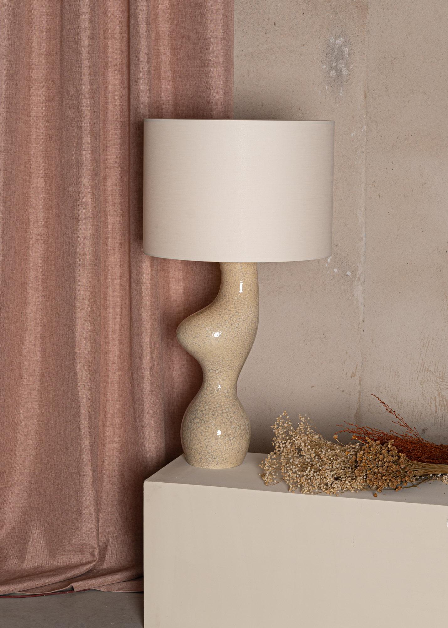 Beige Ceramic Venuso Table Lamp by Simone & Marcel
Dimensions: Ø 50 x H 78 cm.
Materials: Cotton and ceramic.

Also available in different ceramic options. Custom options available on request. Please contact us. 

All our lamps can be wired