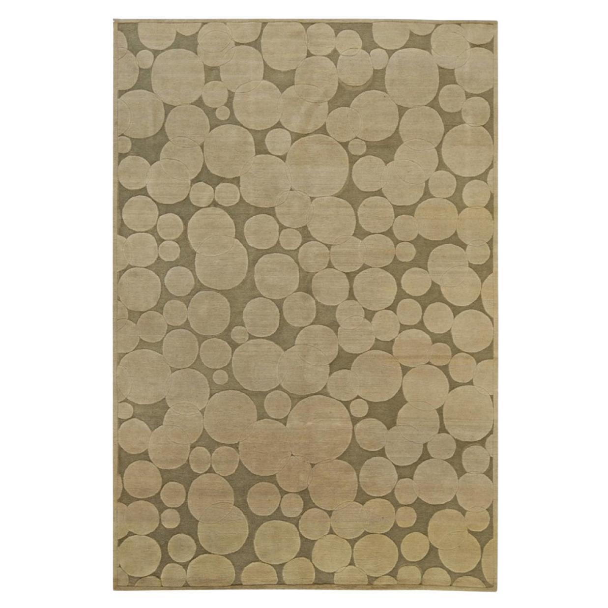 Alfombra de diseño circular beige