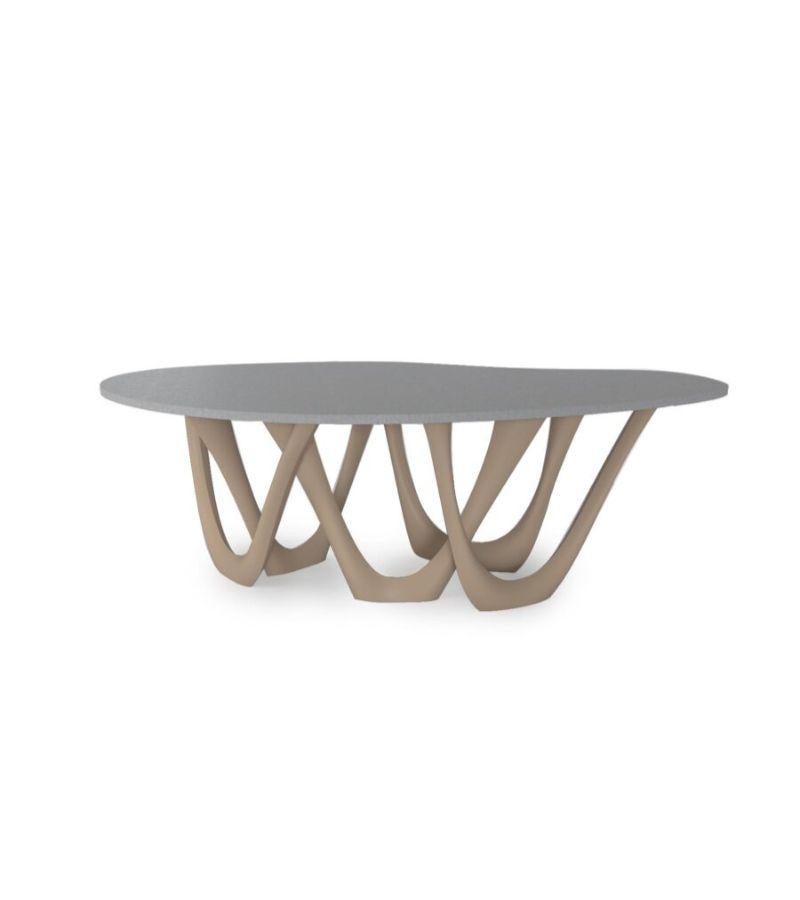 Beige Grey Concrete Steel G-Table by Zieta
Dimensions: D 110 x W 220 x H 75 cm 
Material: Concrete top. Carbon Steel base. 
Finish: Powder-Coated.
Available in colors: Beige, Black/Brown, Black glossy, Blue-grey, Concrete grey, Graphite, Gray Beige,